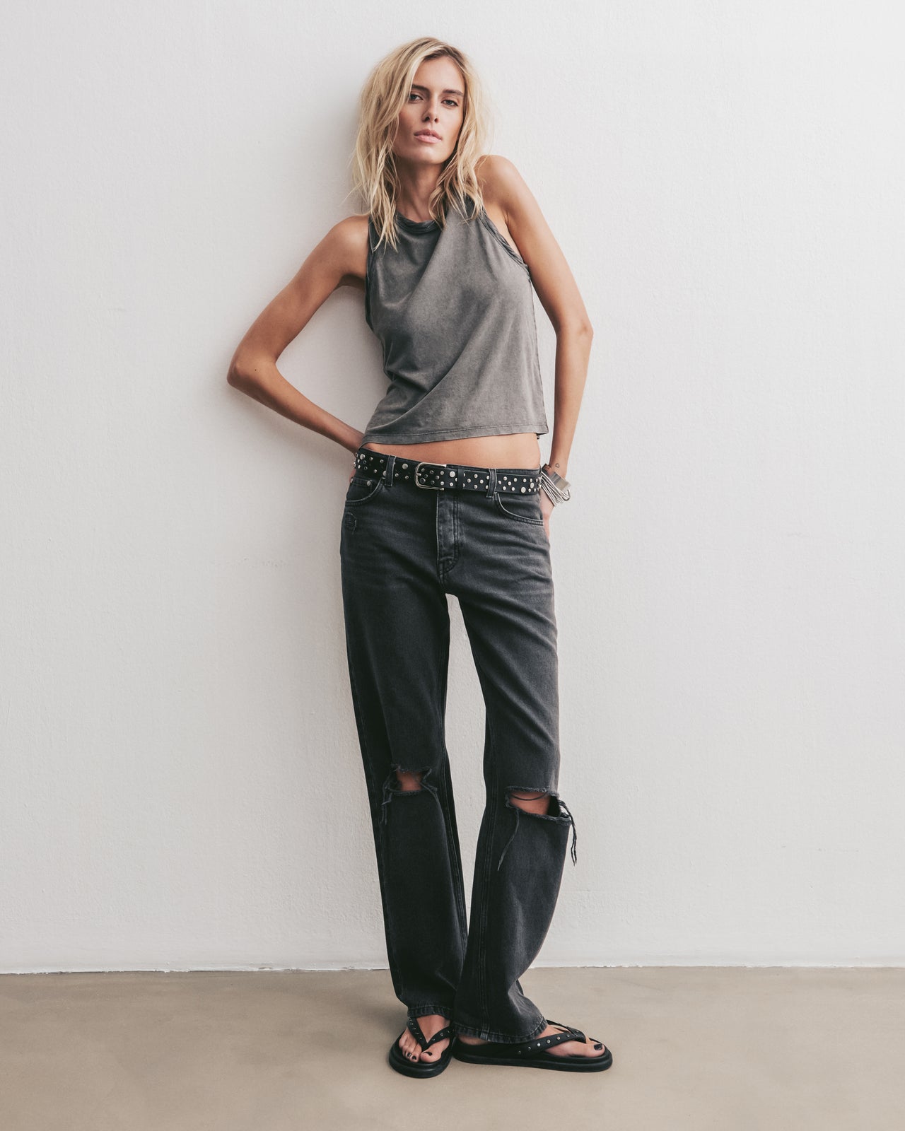 Dark Faded Tank Top Black Ripped Relaxed Jeans Black Studded Leather Sandals - Product photo