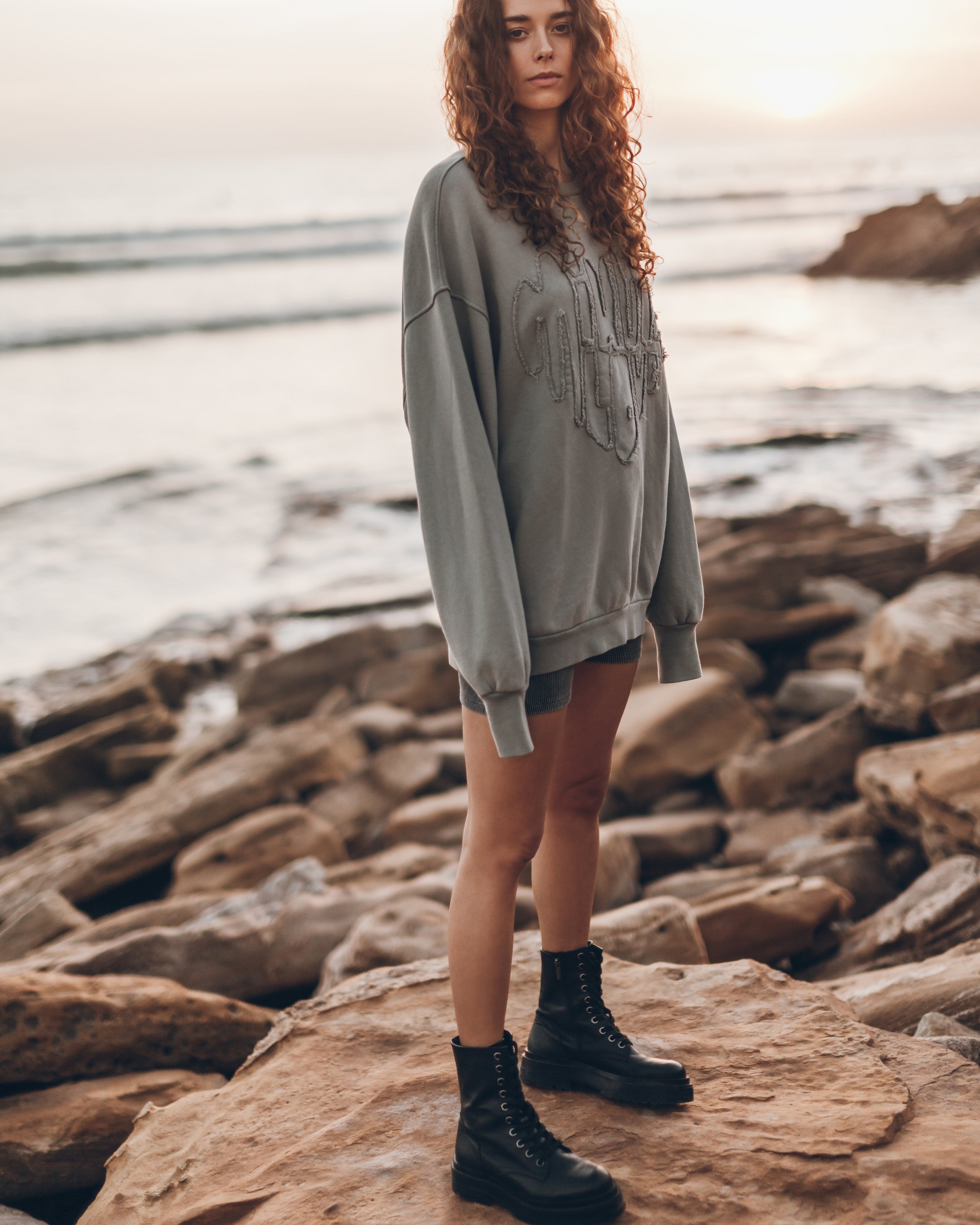 Green Faded Love Relaxed Sweater Dark Ribbed Biker Shorts Black Laced Leather Boots - Product photo