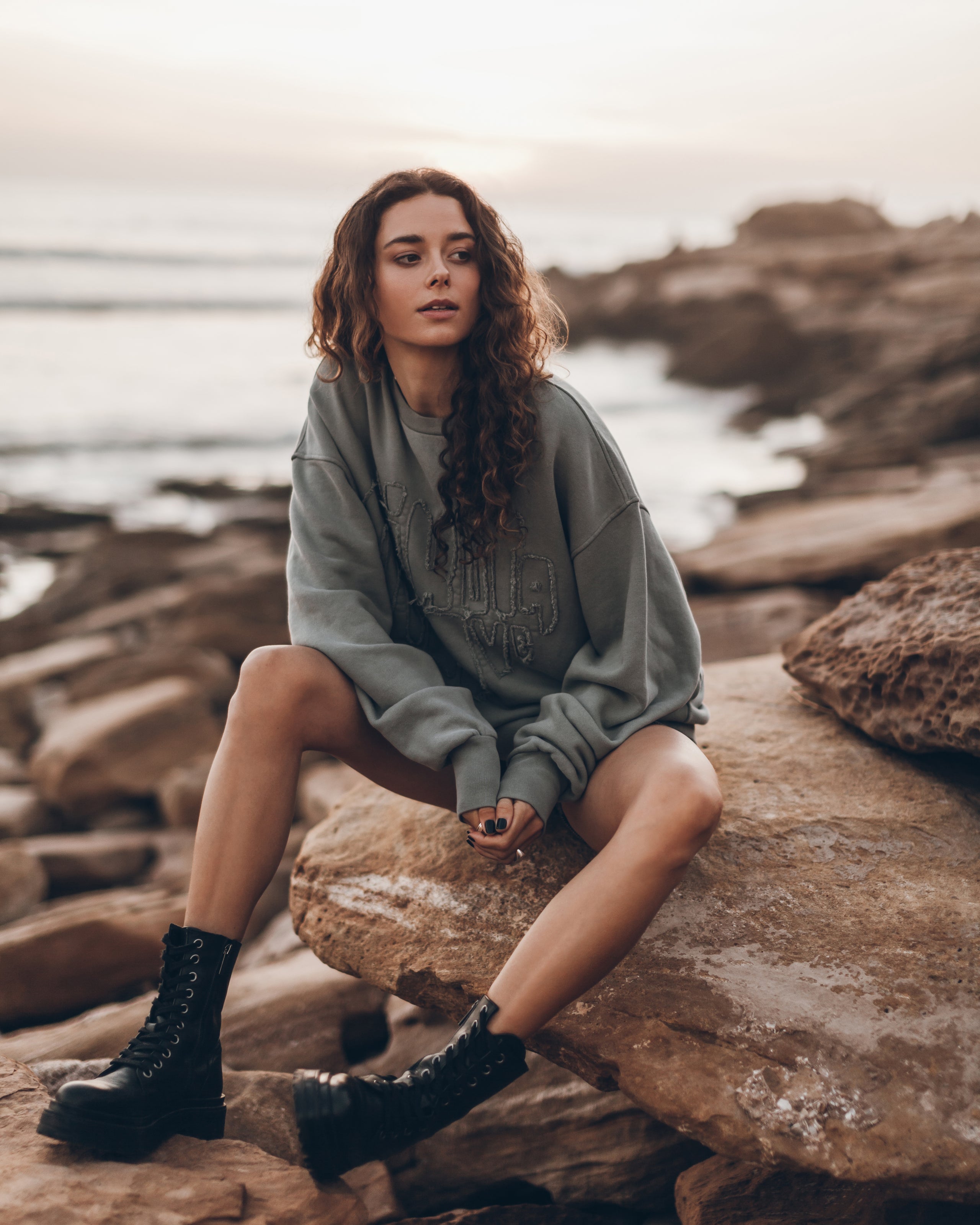 Green Faded Love Relaxed Sweater Dark Ribbed Biker Shorts Black Laced Leather Boots - Product photo