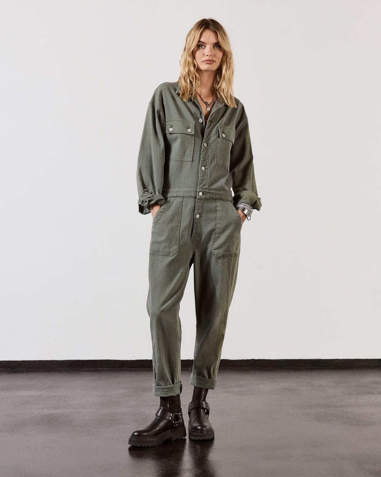 Green Jumpsuit Black Biker Boots - Product photo