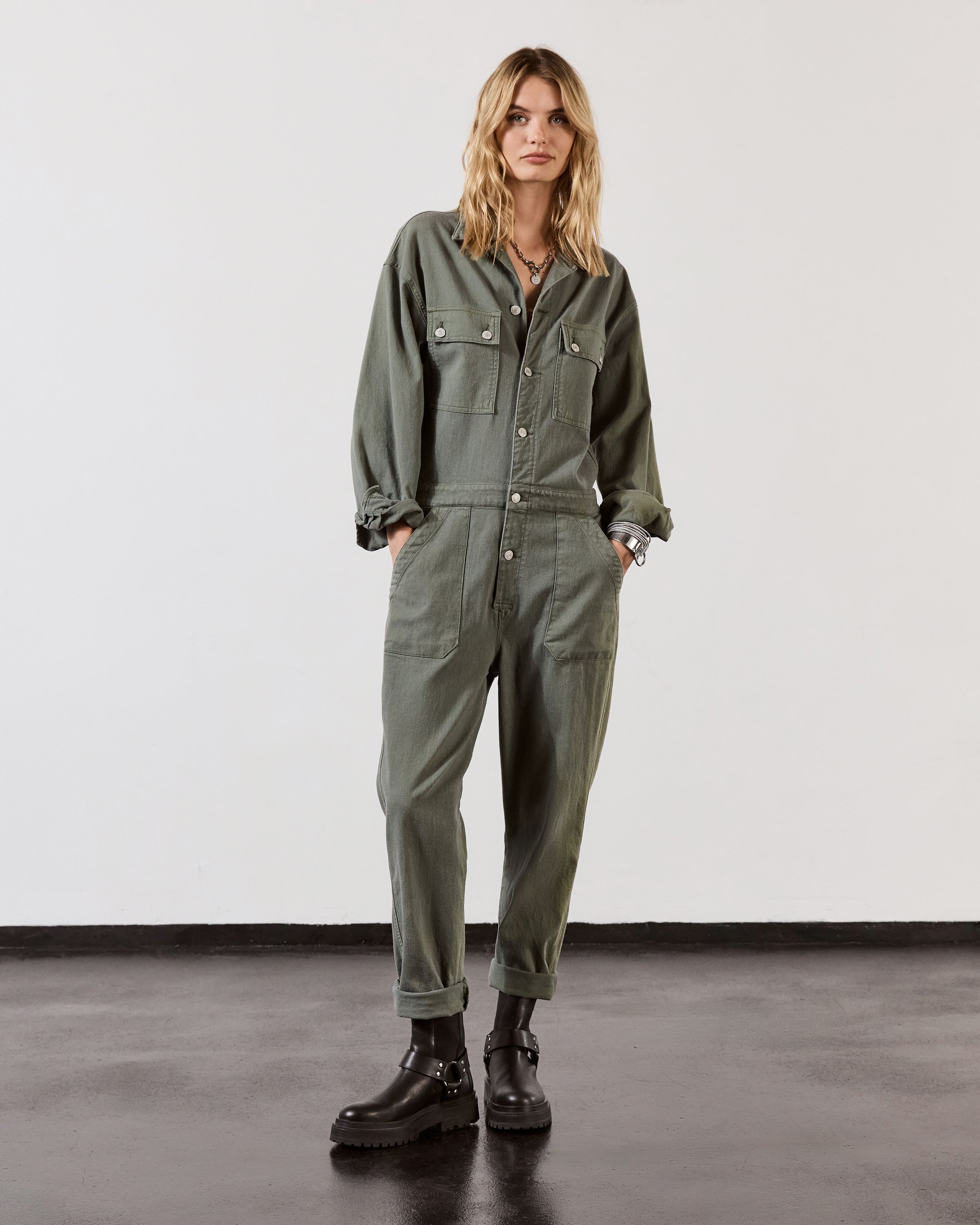 Green Jumpsuit Black Biker Boots - Product photo