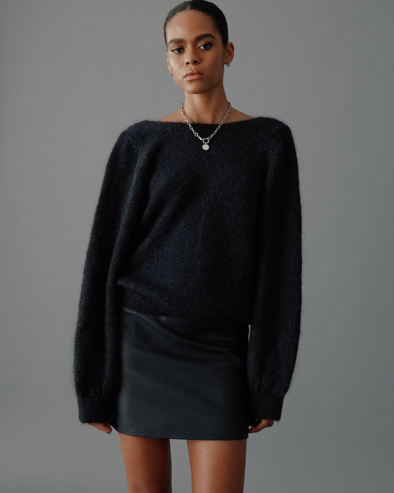 The Black Low Back Knotted Knit Sweater