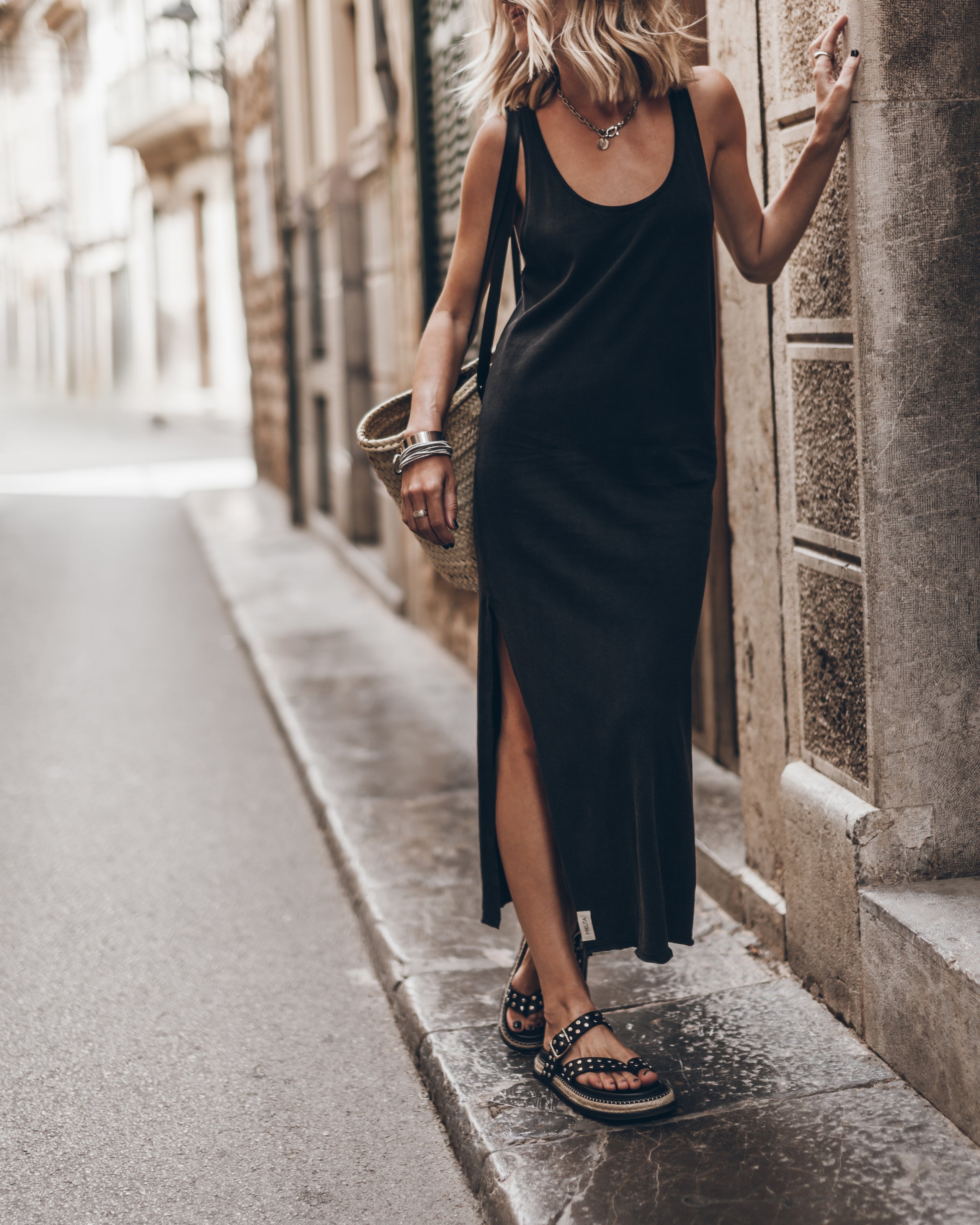 The Dark Twisted Tank Dress The Black Chunky Sandals The Large Cesta Bag - Product photo