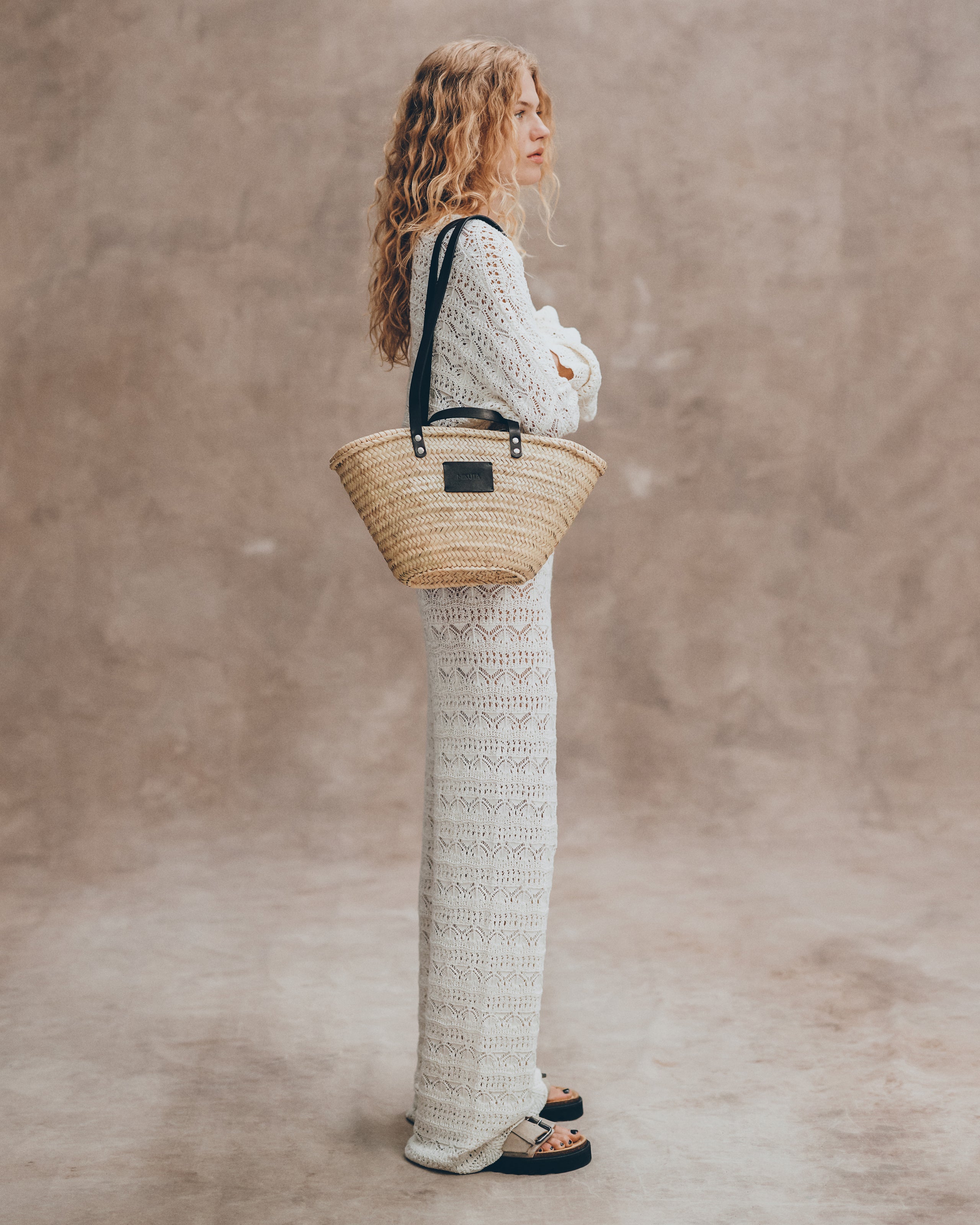 The Ecru Crochet Sweater The Ecru Crochet Pants The Small Cesta Bag The Beige Suede Buckle Sandal...