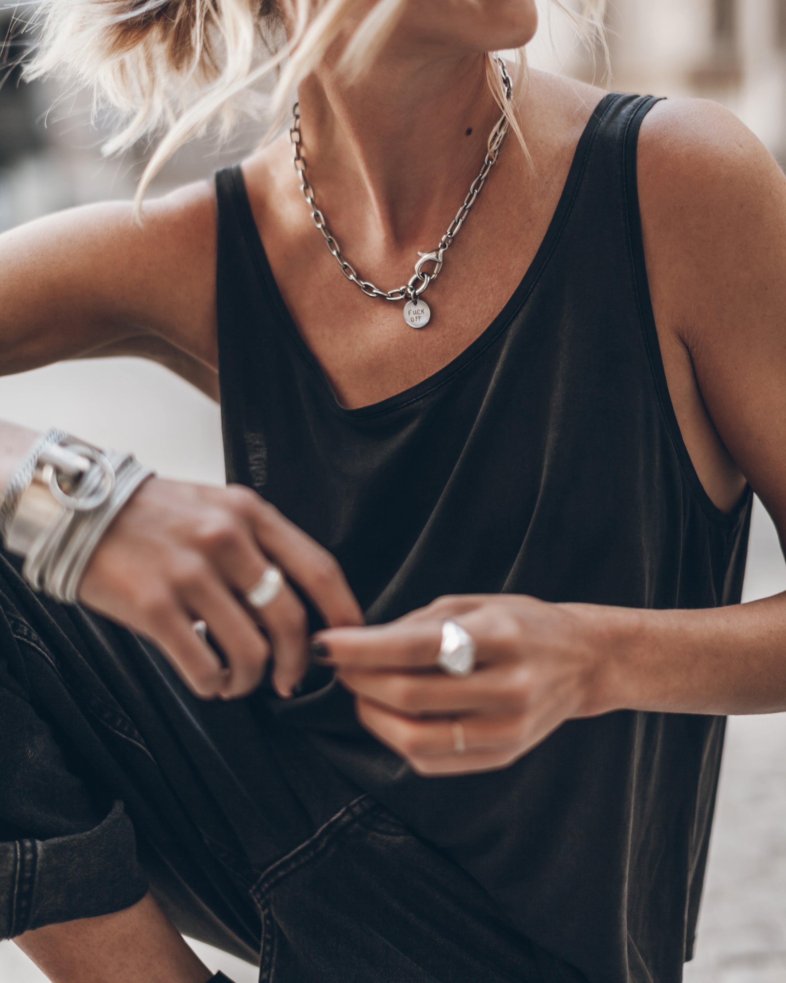 F* Off necklace layered with dark tank top - bold fashion statement