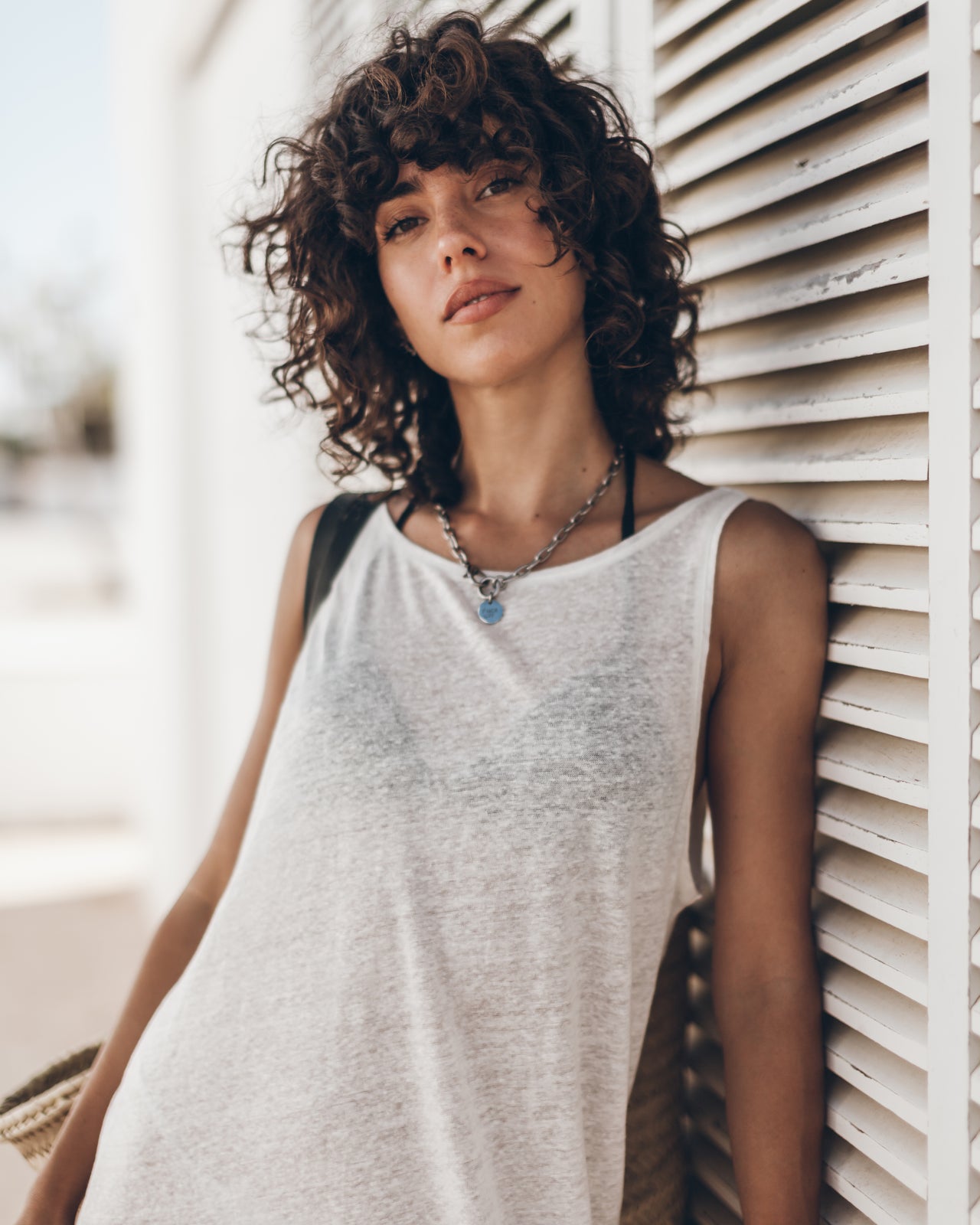 The White Low Back Linen Tank Dress The Black Leather Buckle Sandals The Large Cesta Bag Guindi -...