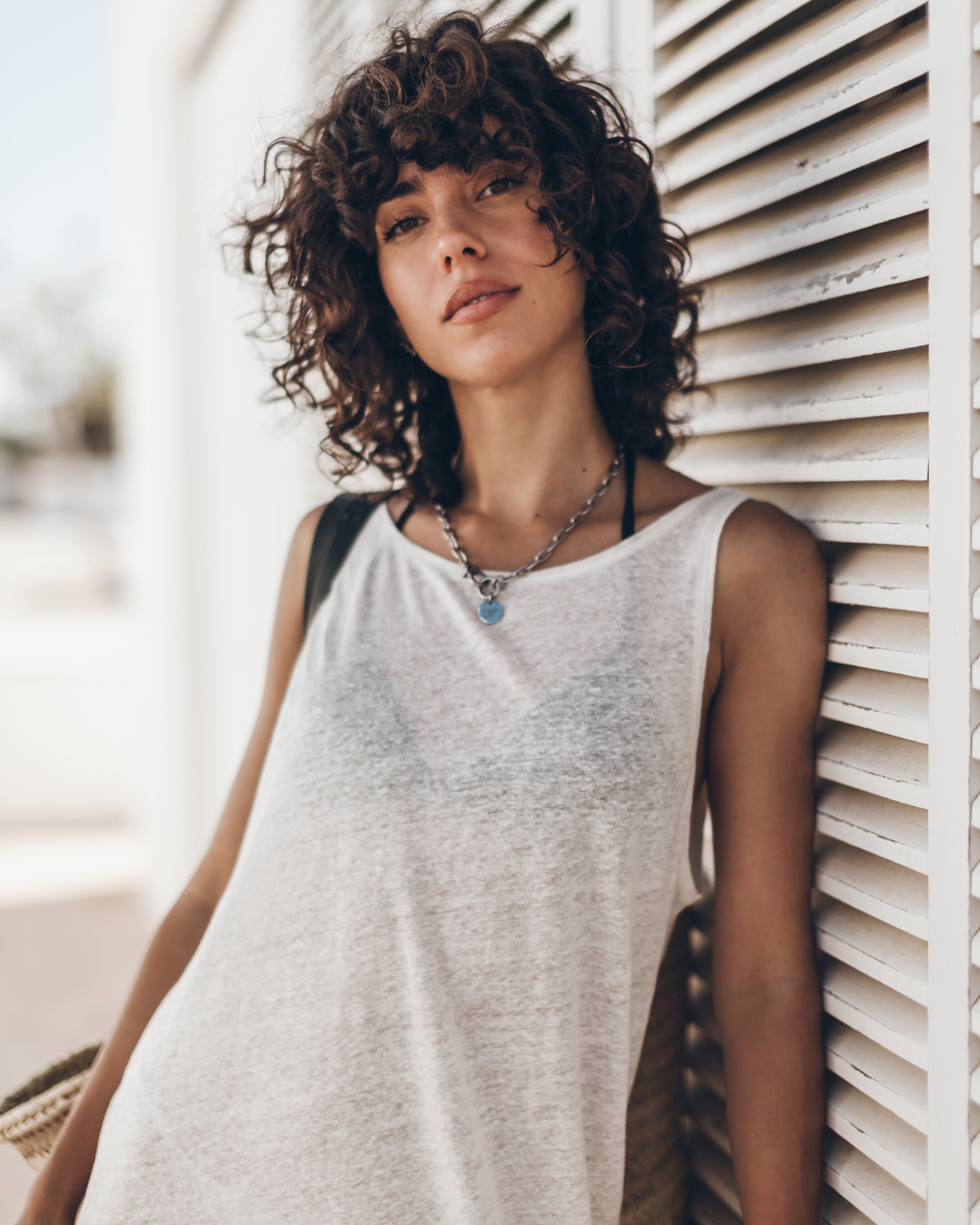 The White Low Back Linen Tank Dress The Black Leather Buckle Sandals The Large Cesta Bag Guindi -...