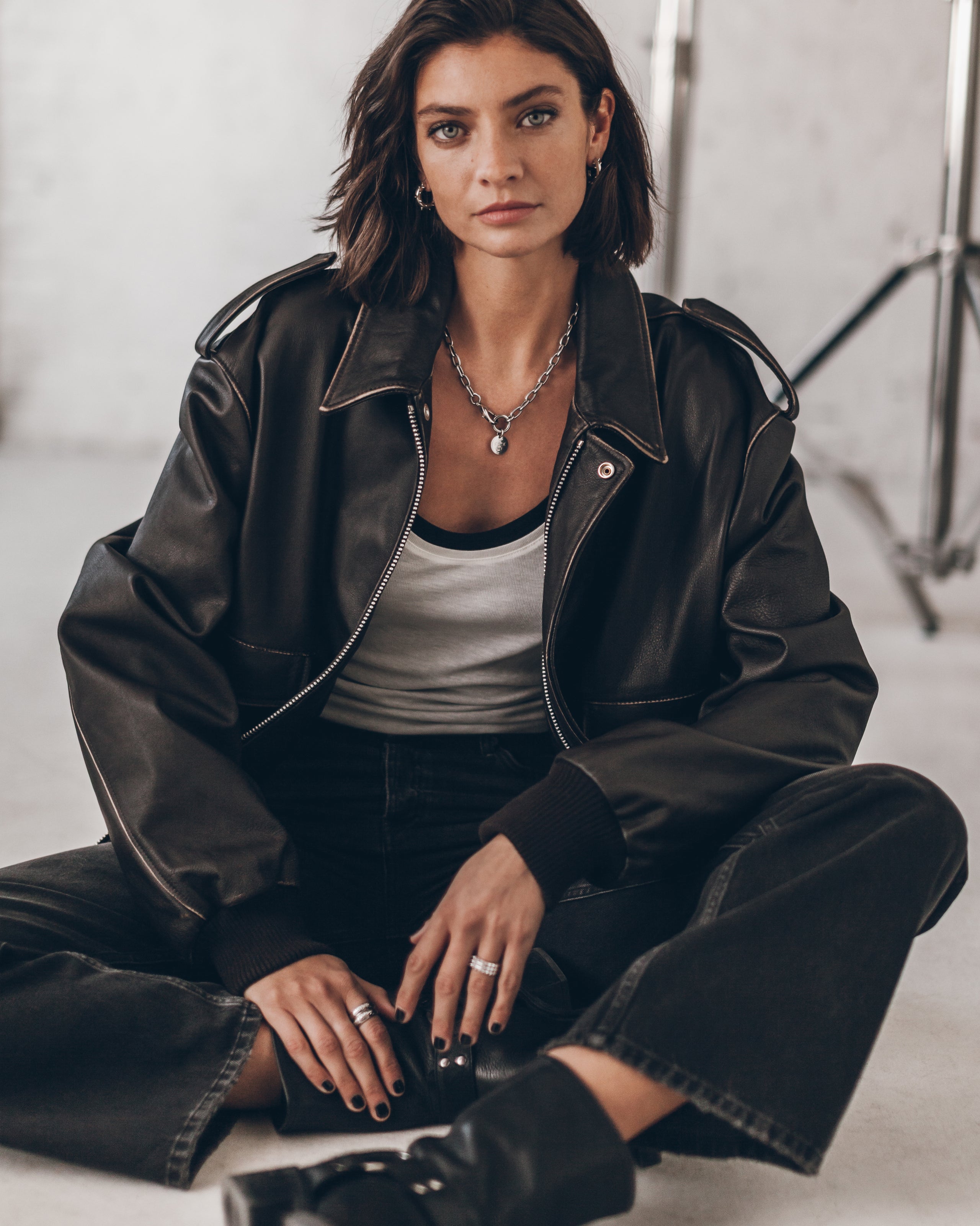 The White Sheer Tank Top The Black Sheer Tank Top The Brown Vintage Leather Jacket The Black Loos...