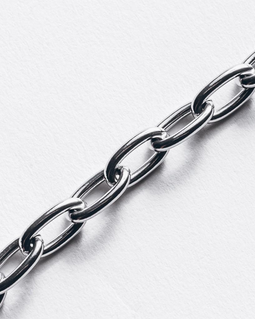 MIKUTA F* Off necklace close-up - contemporary silver jewelry