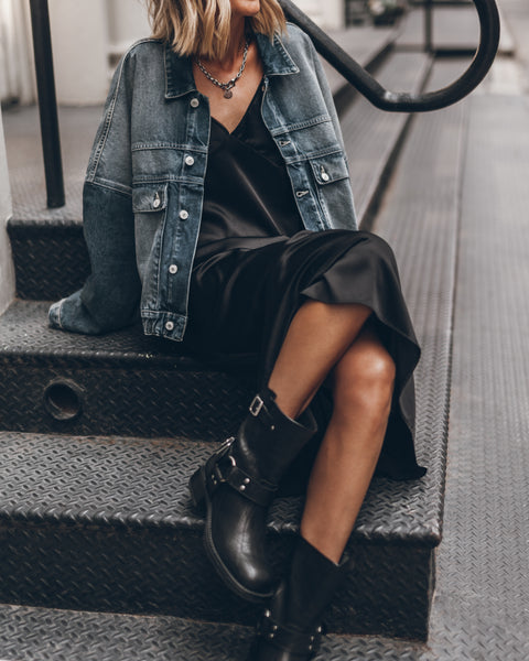 dress with denim jacket and boots 14 Stylish Summer Outfits With Cowboy Boots