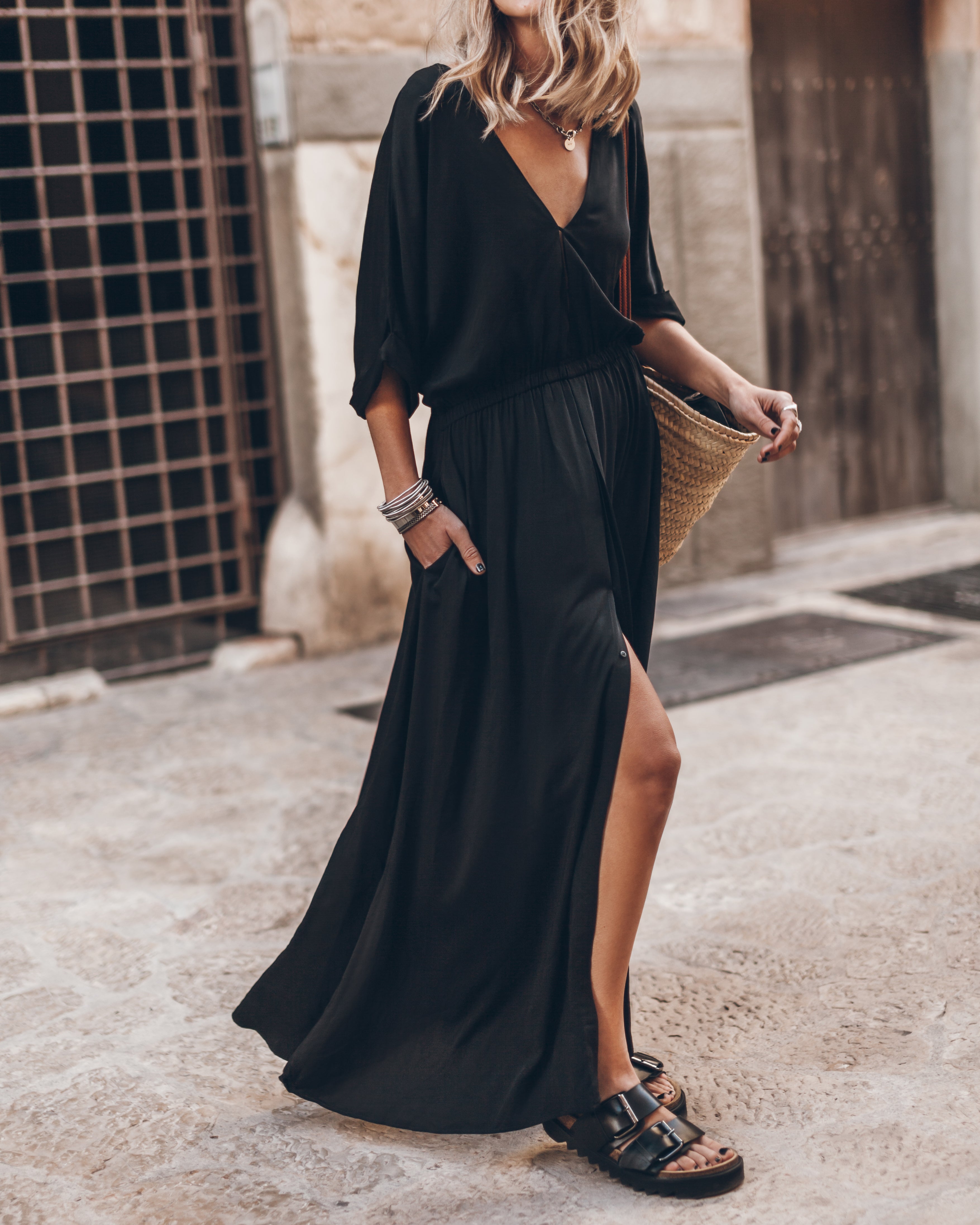 black flowy midi dress Account style hem gives it graceful movement while maintaining a modest O'Neill Women's Piper Midi Dress,