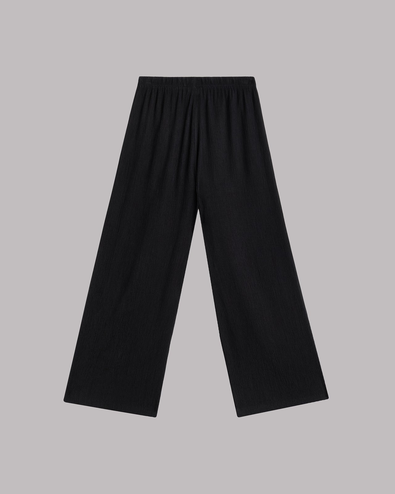 Black wide-leg pants on a gray background