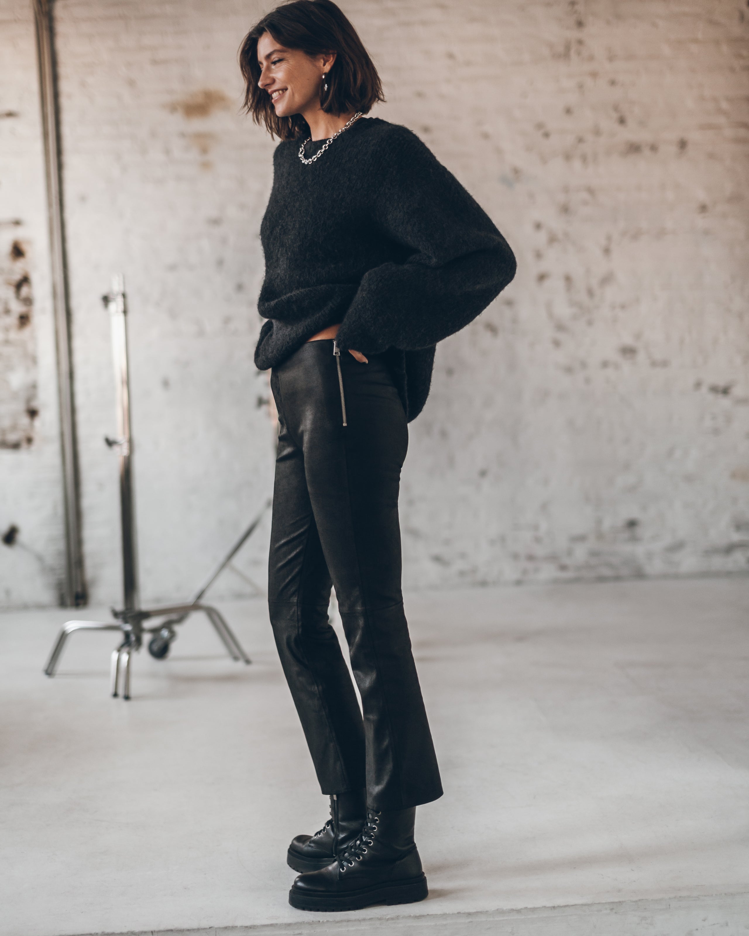 The Black Fluffy Alpaca Knit Sweater The Black Cropped Leather Pants The Black Laced Leather Boot...