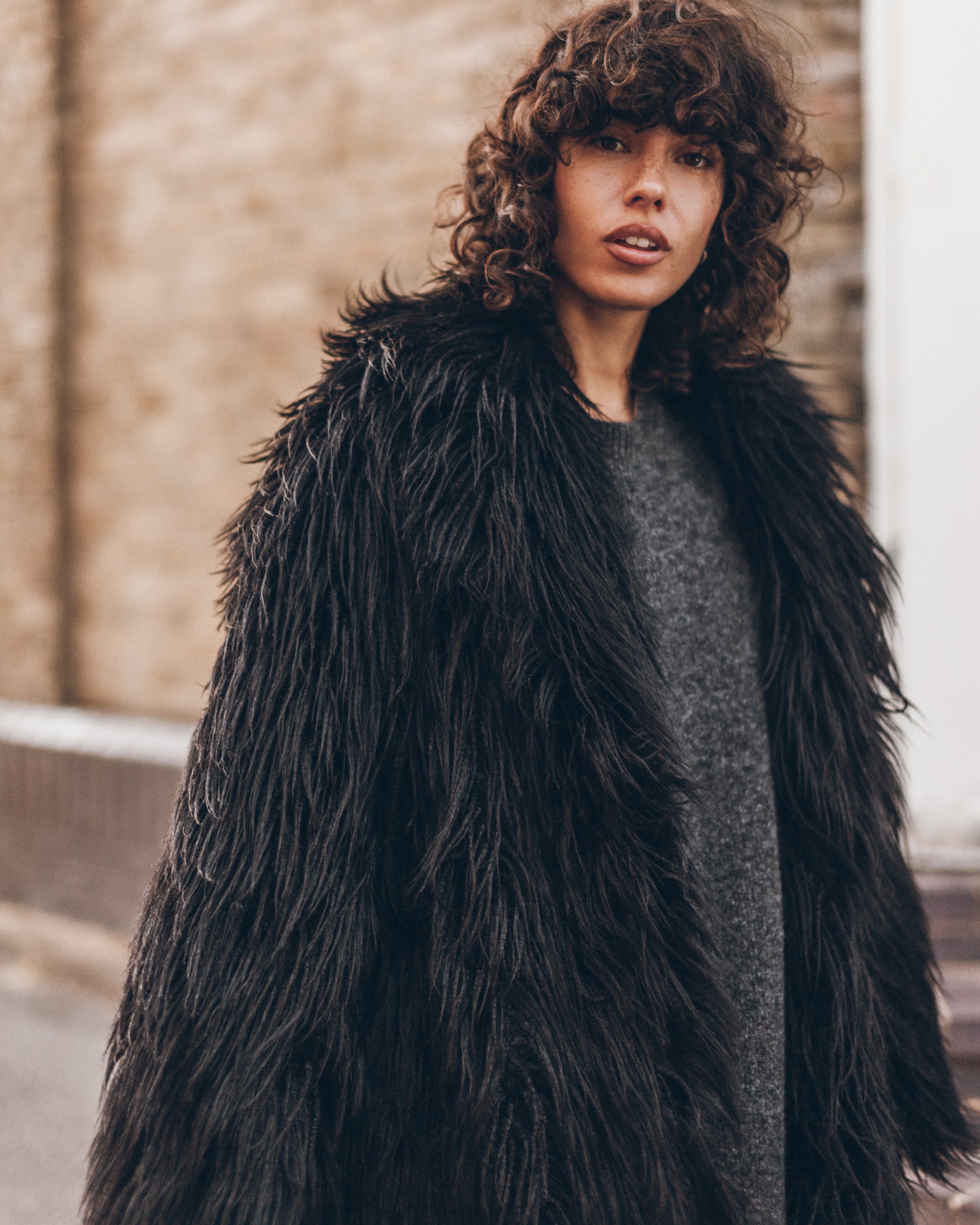 The Black Fluffy Coat