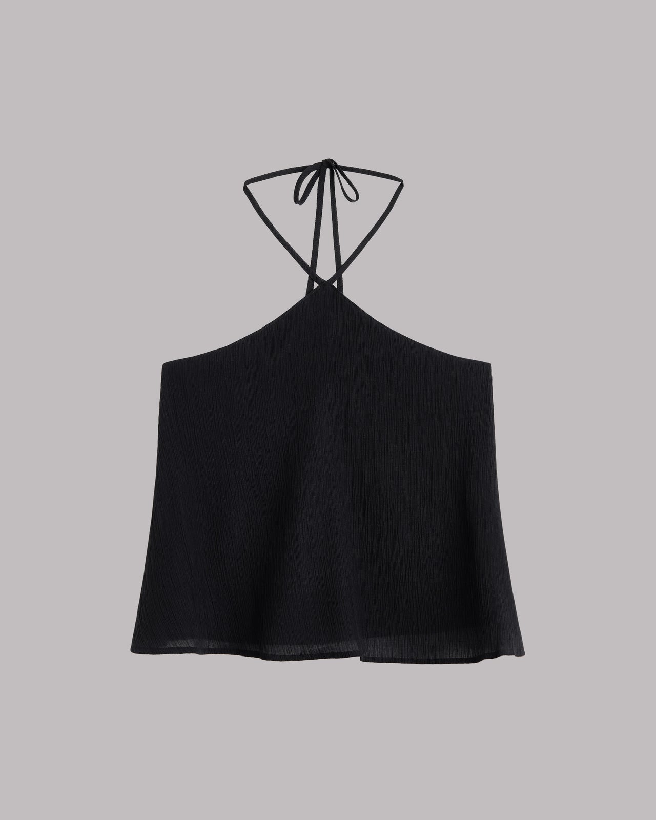 Black halter top on a gray background