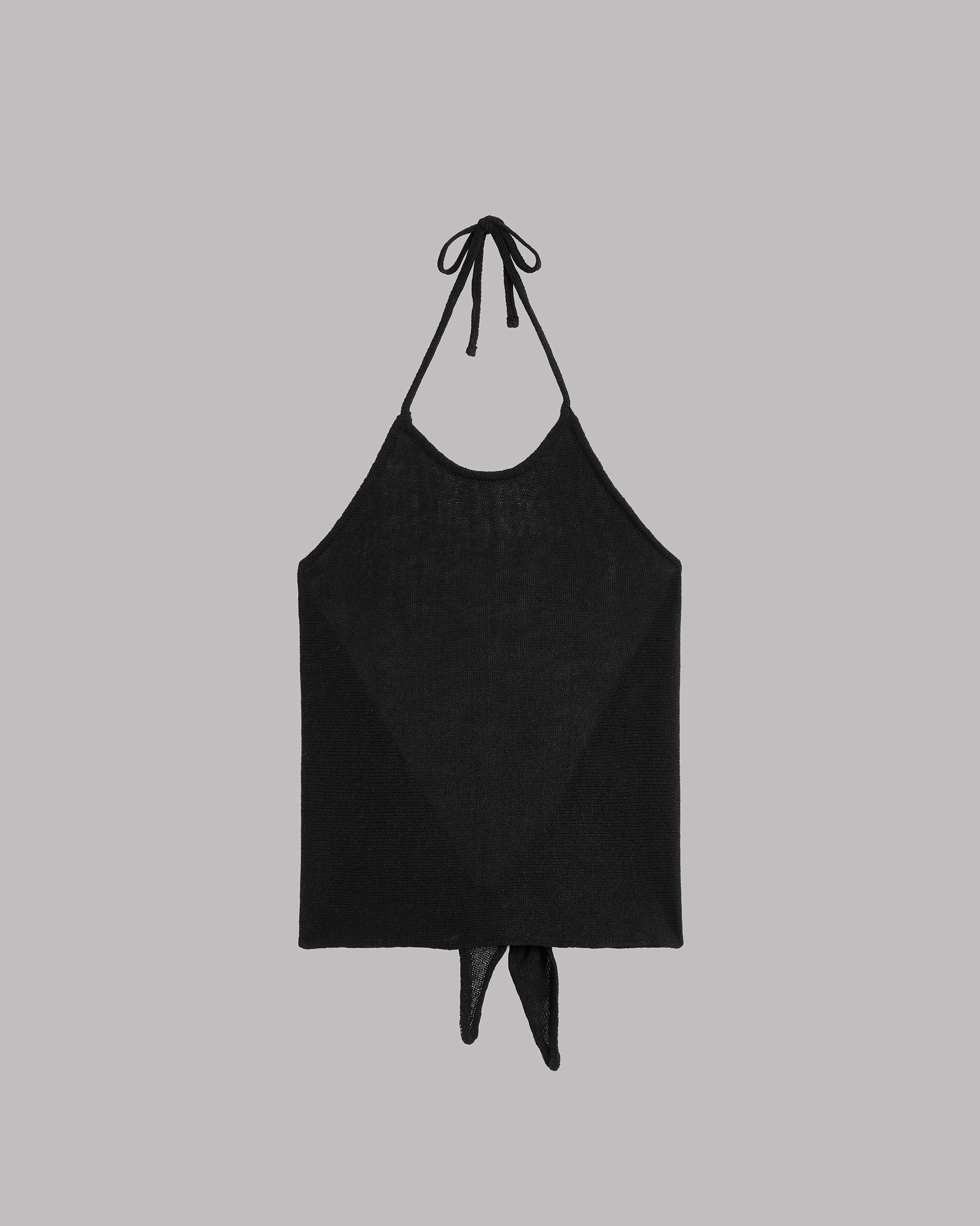Black halter top on a light gray background