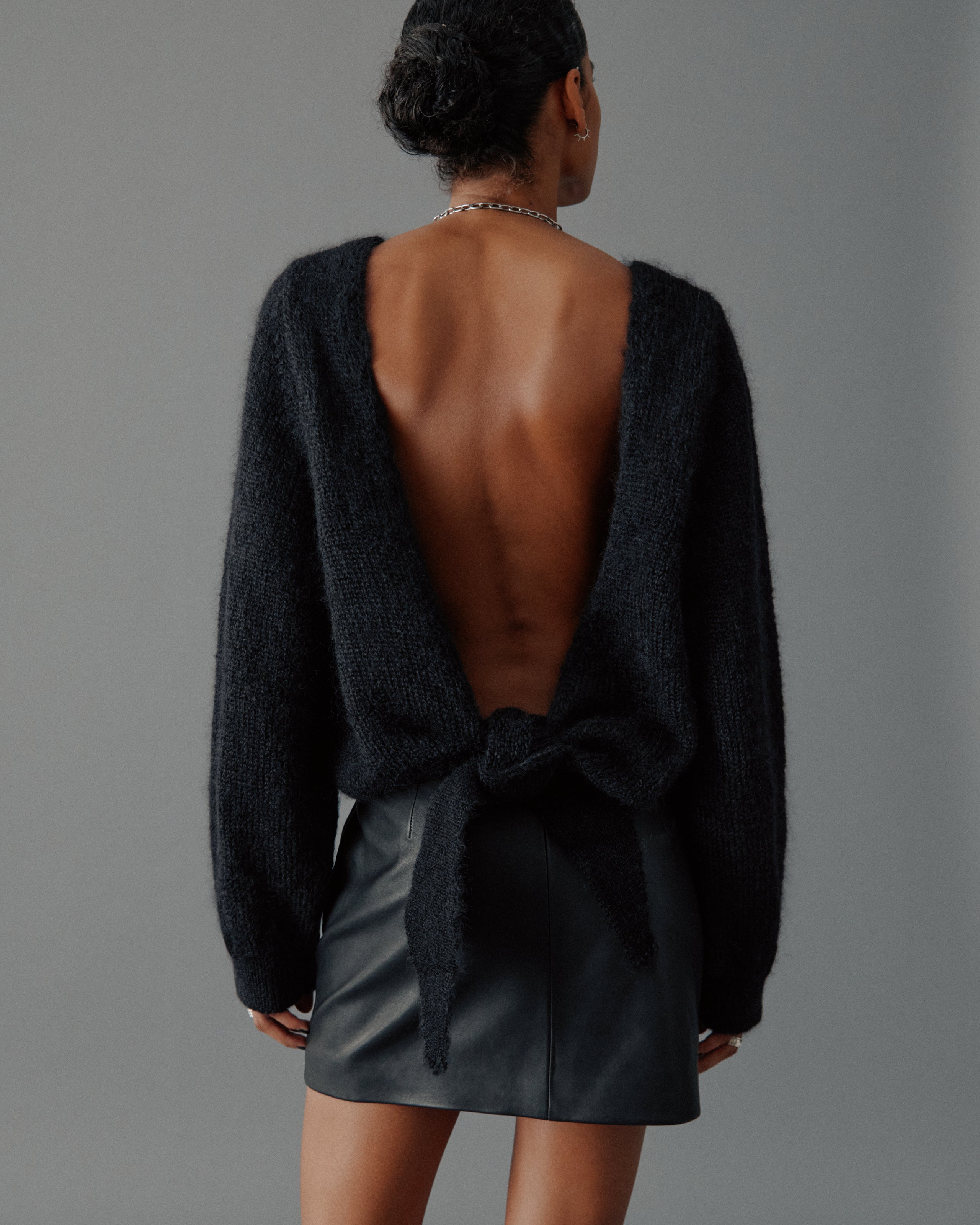 The Black Low Back Knotted Knit Sweater