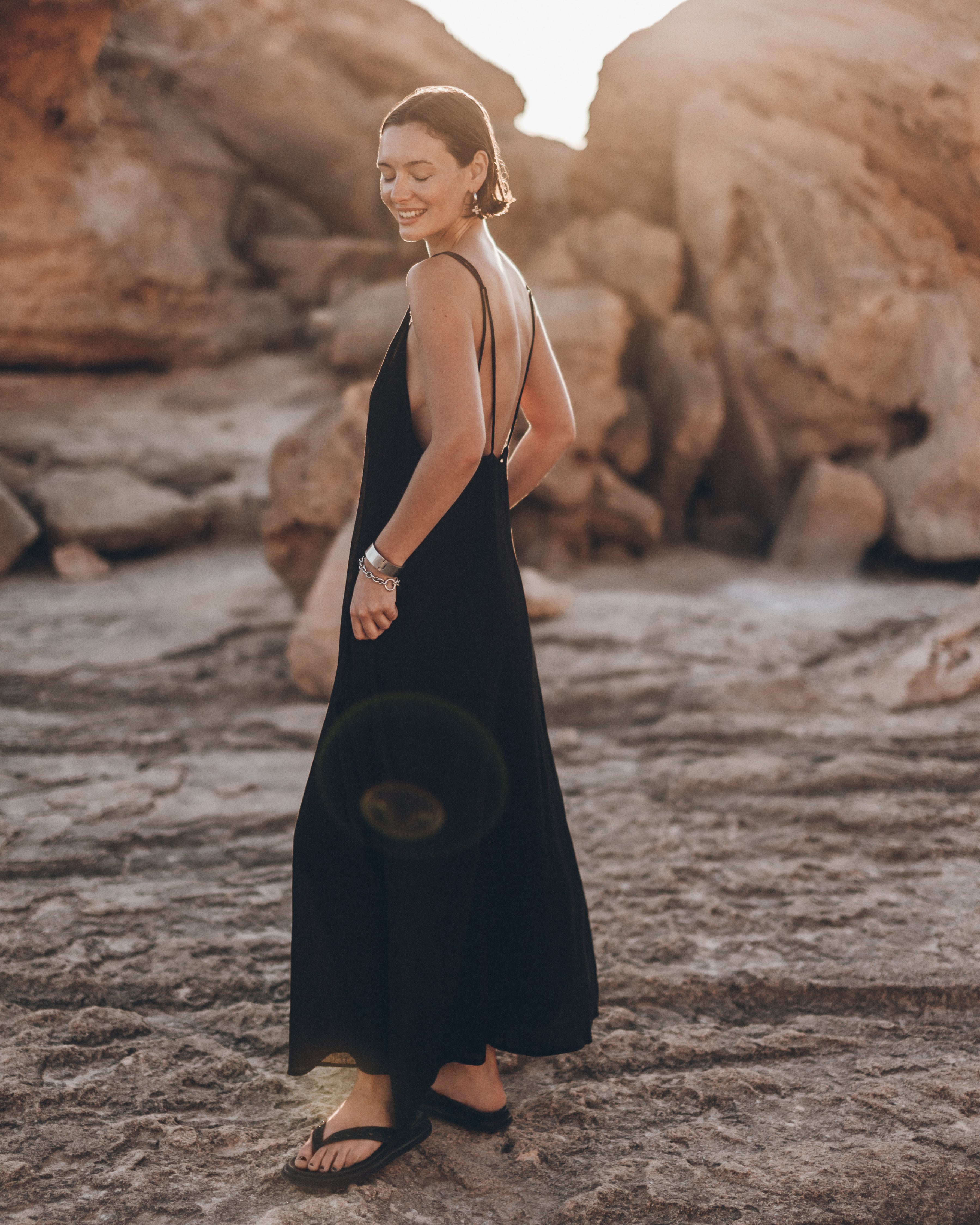 style a black maxi dress Creative Layering with a Black Maxi Dress It's Julien