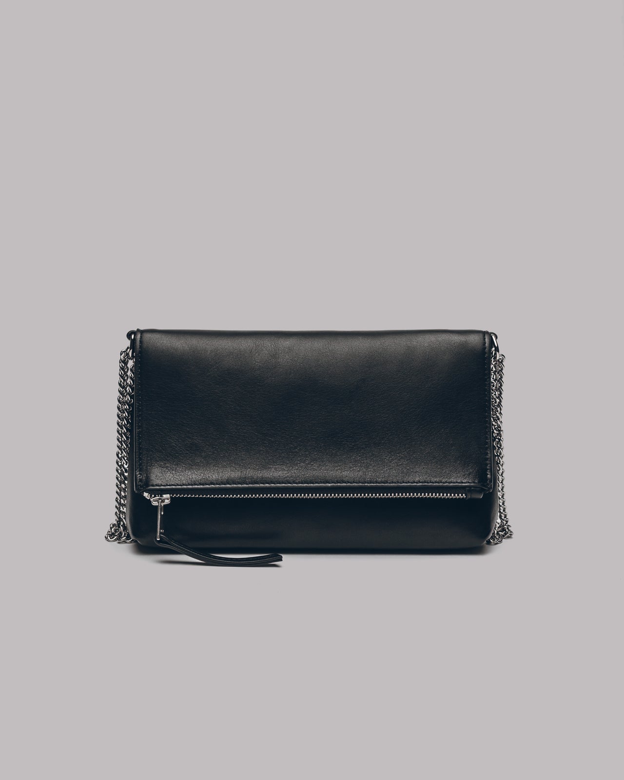 Black leather clutch bag with chain detail on a gray background