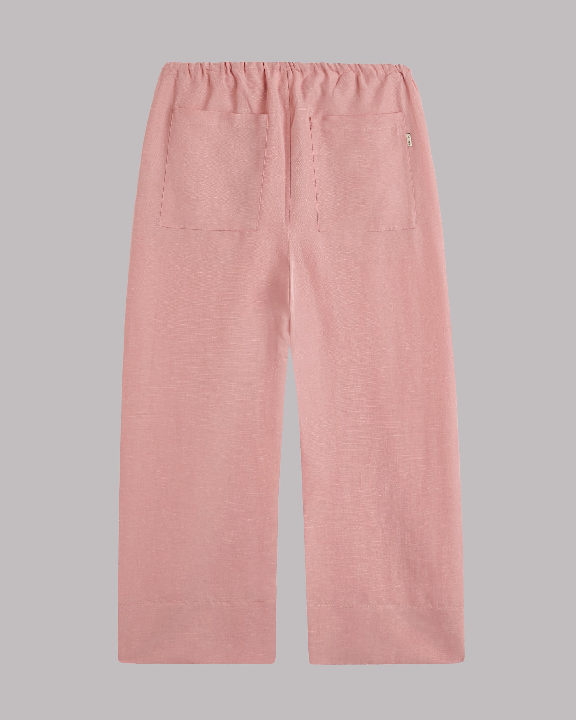 Blush cropped pants on a gray background.