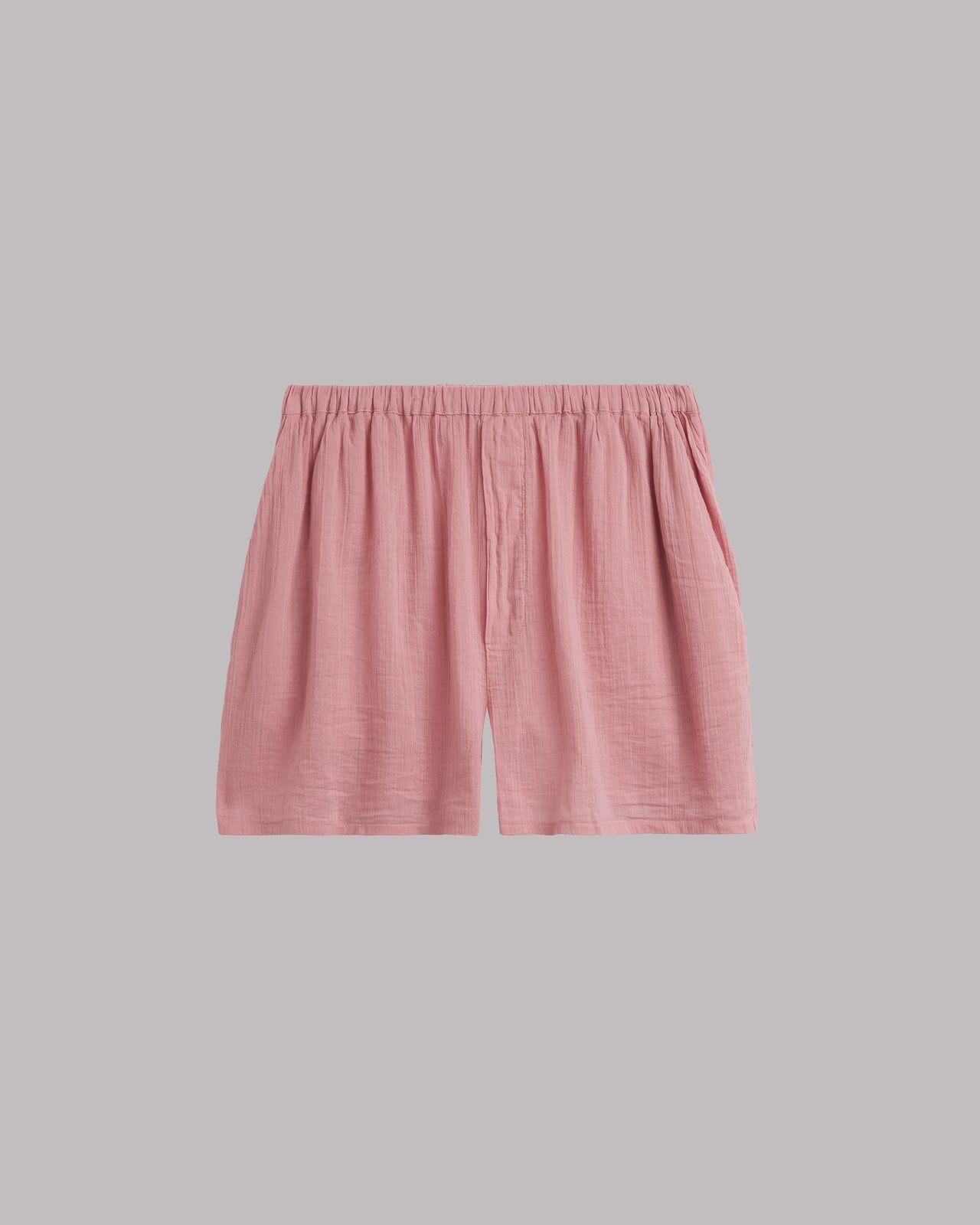 Pink shorts on a gray background