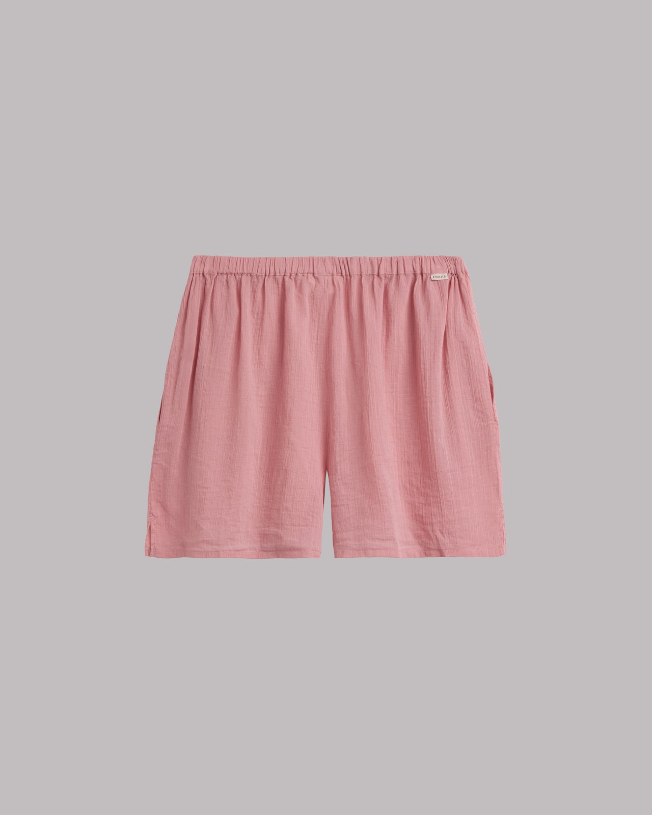 Pink shorts on a gray background