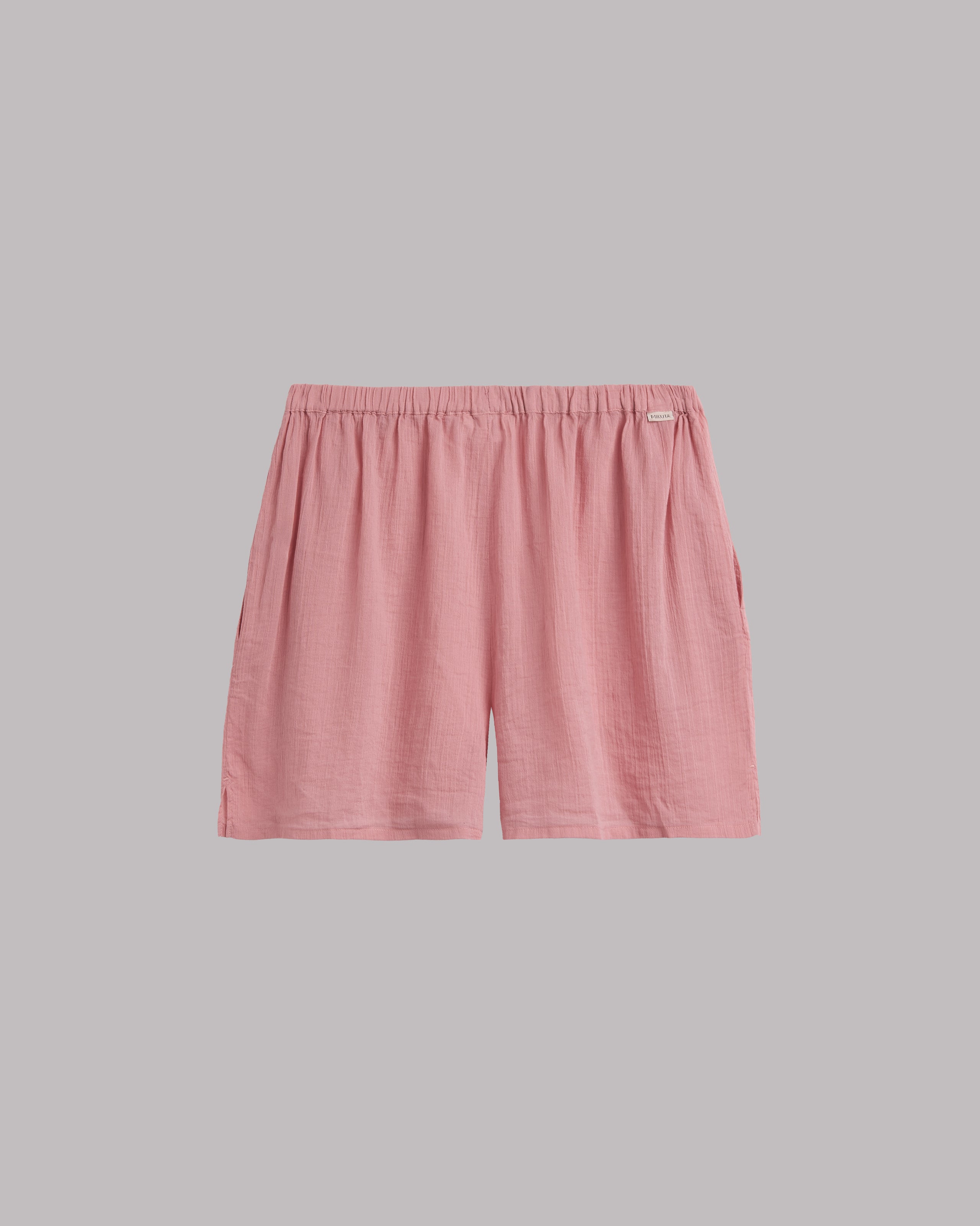 Pink shorts on a gray background
