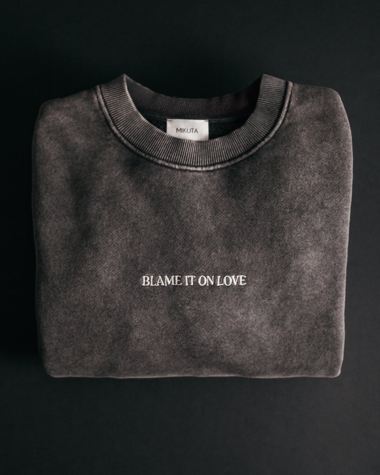 The Dark Faded Blame It On Love Standard Sweater Product Shot - Product photo