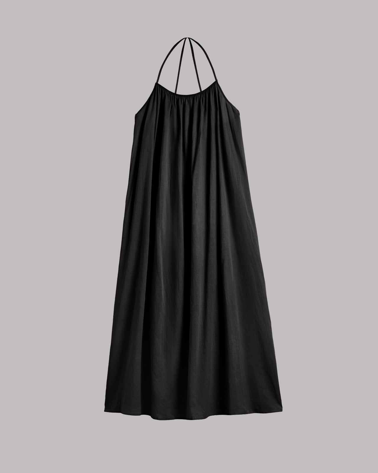 Black halter neck dress on a gray background