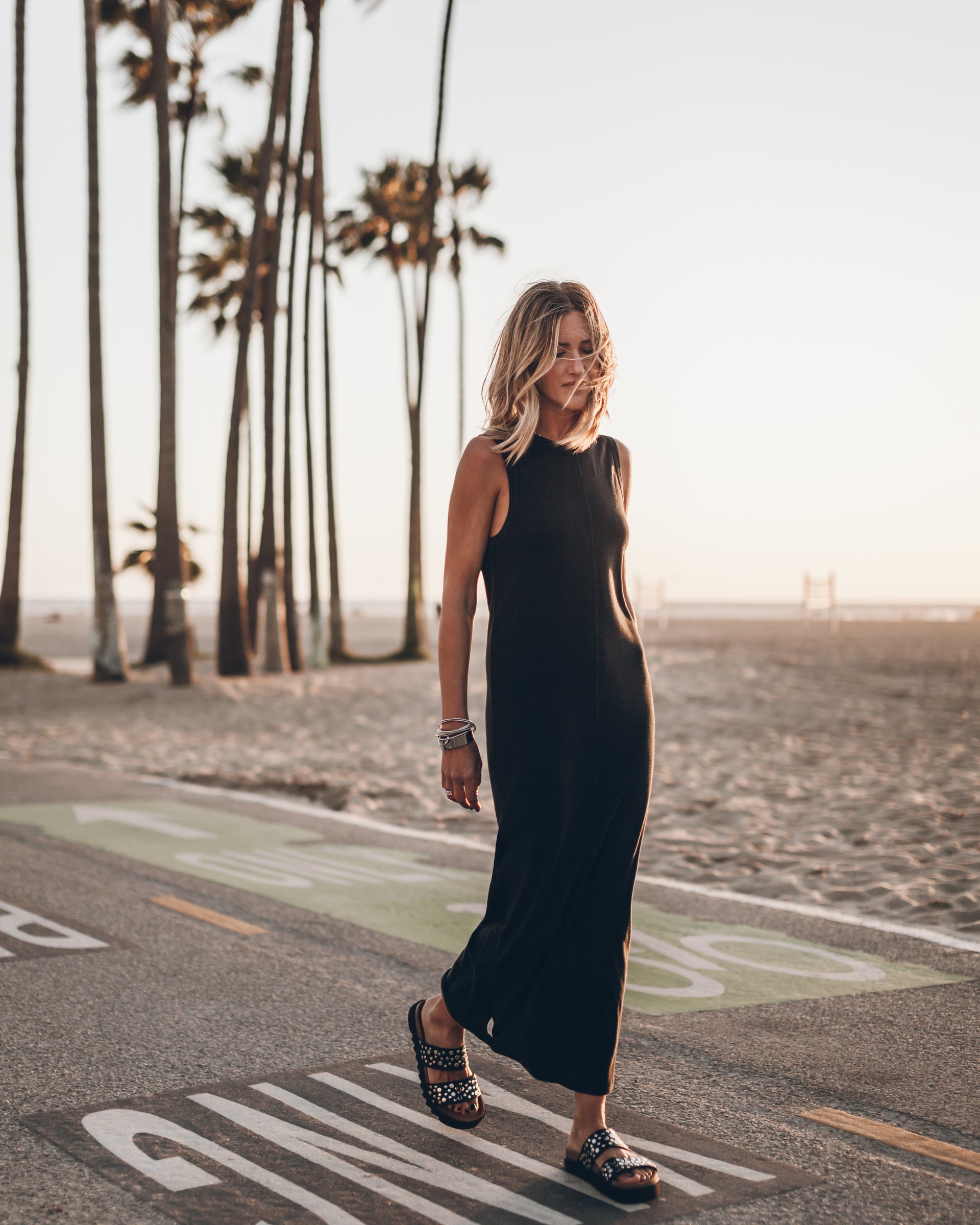 long black dress with sleeves and slit Xscape Evenings Women's Ruffle Scuba Gown - Black