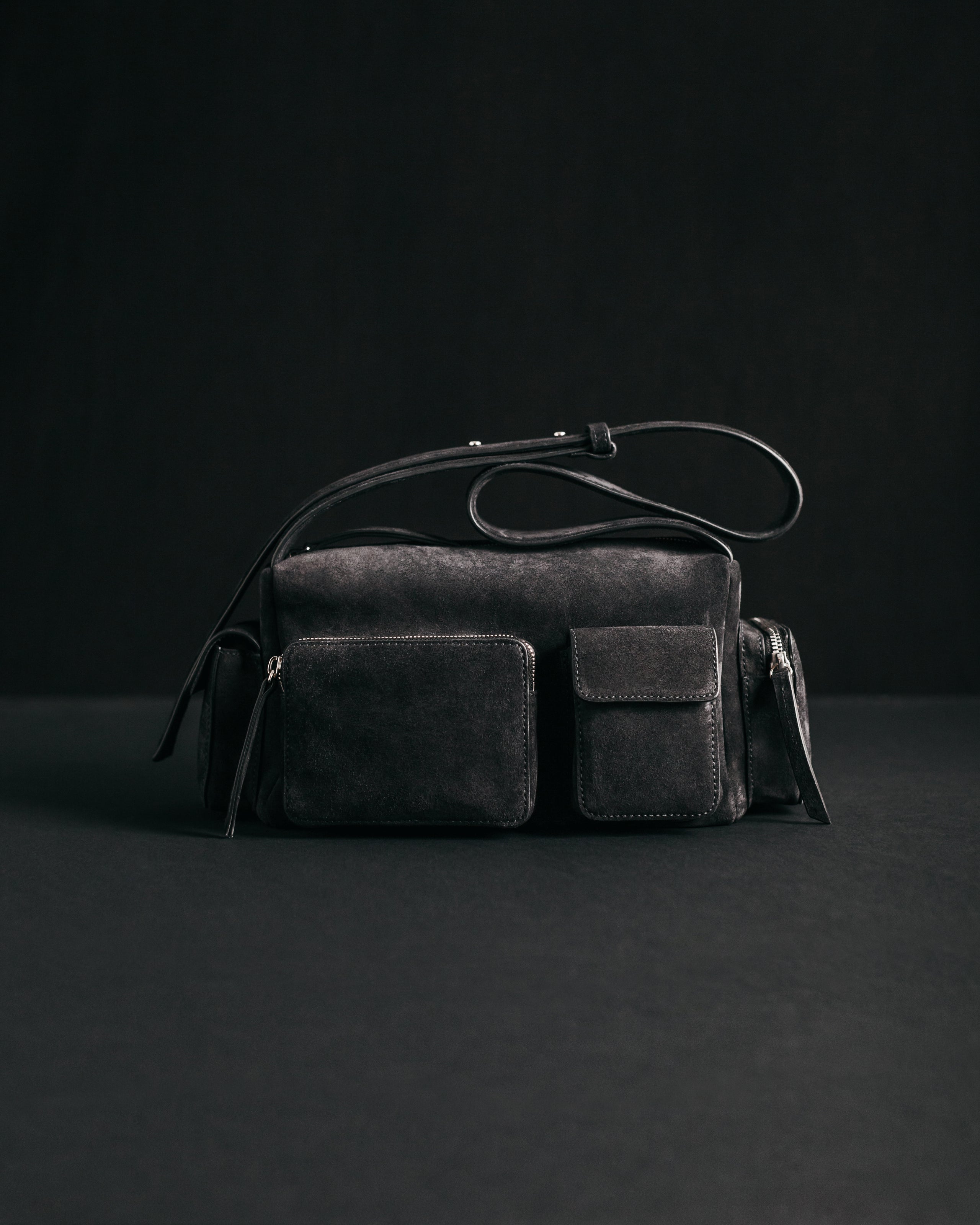 The Dark Suede Minou Bag Product Shot - Product photo