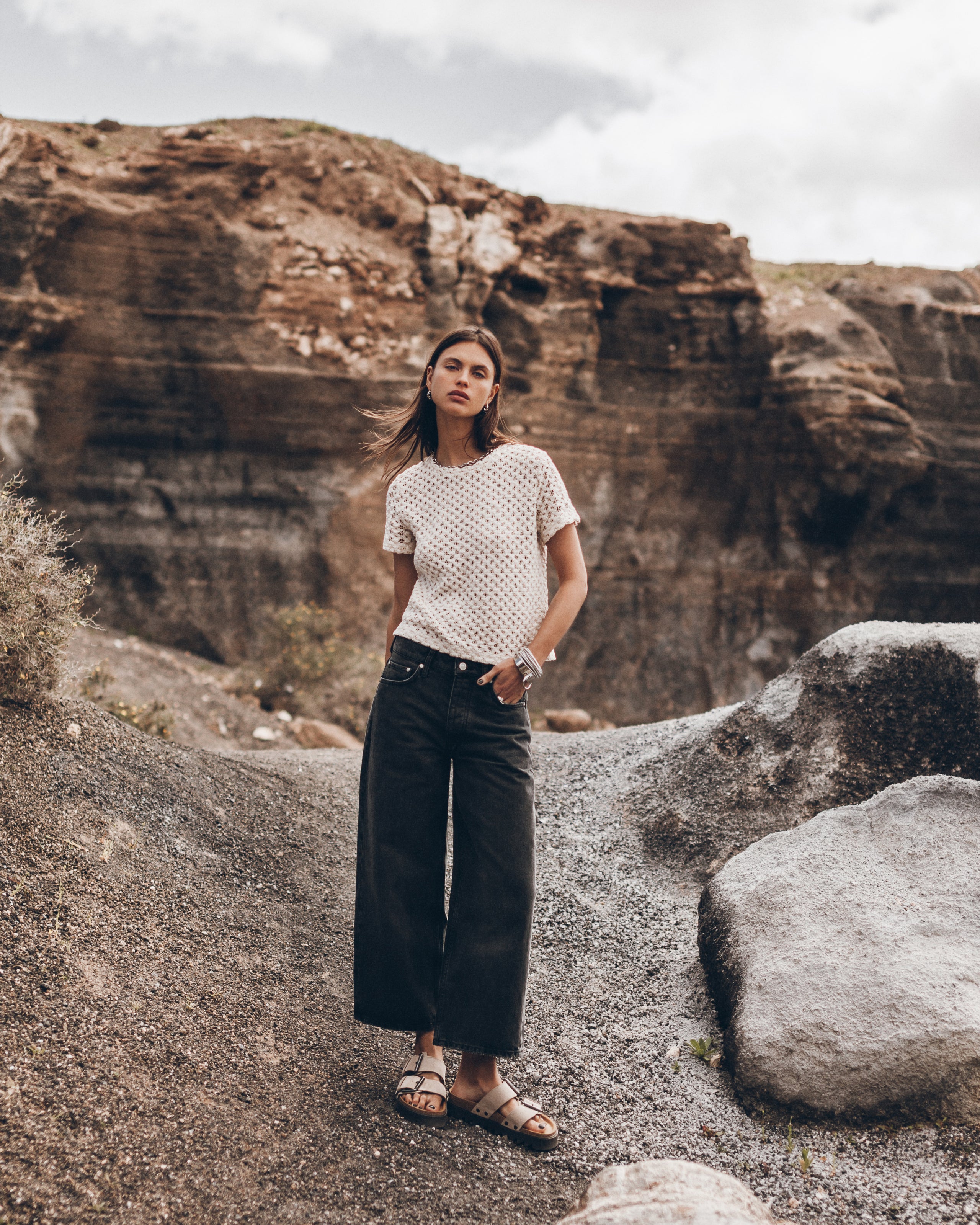 The Ecru Crochet Shirt The Black Cropped Baggy Jeans The Beige Suede Buckle Sandals Desert Califo...