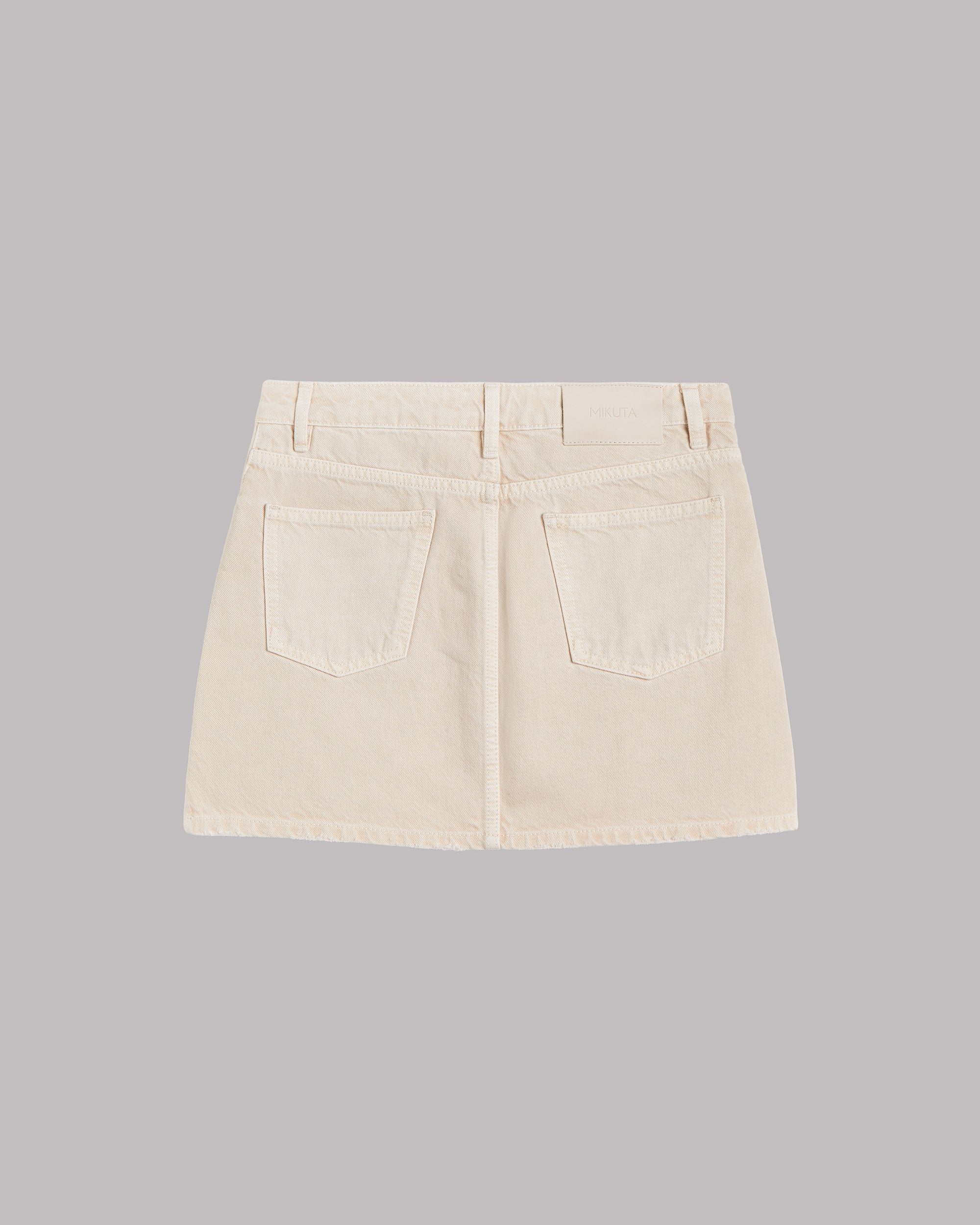 The Greige Denim Mini Skirt Product Shot - Product photo