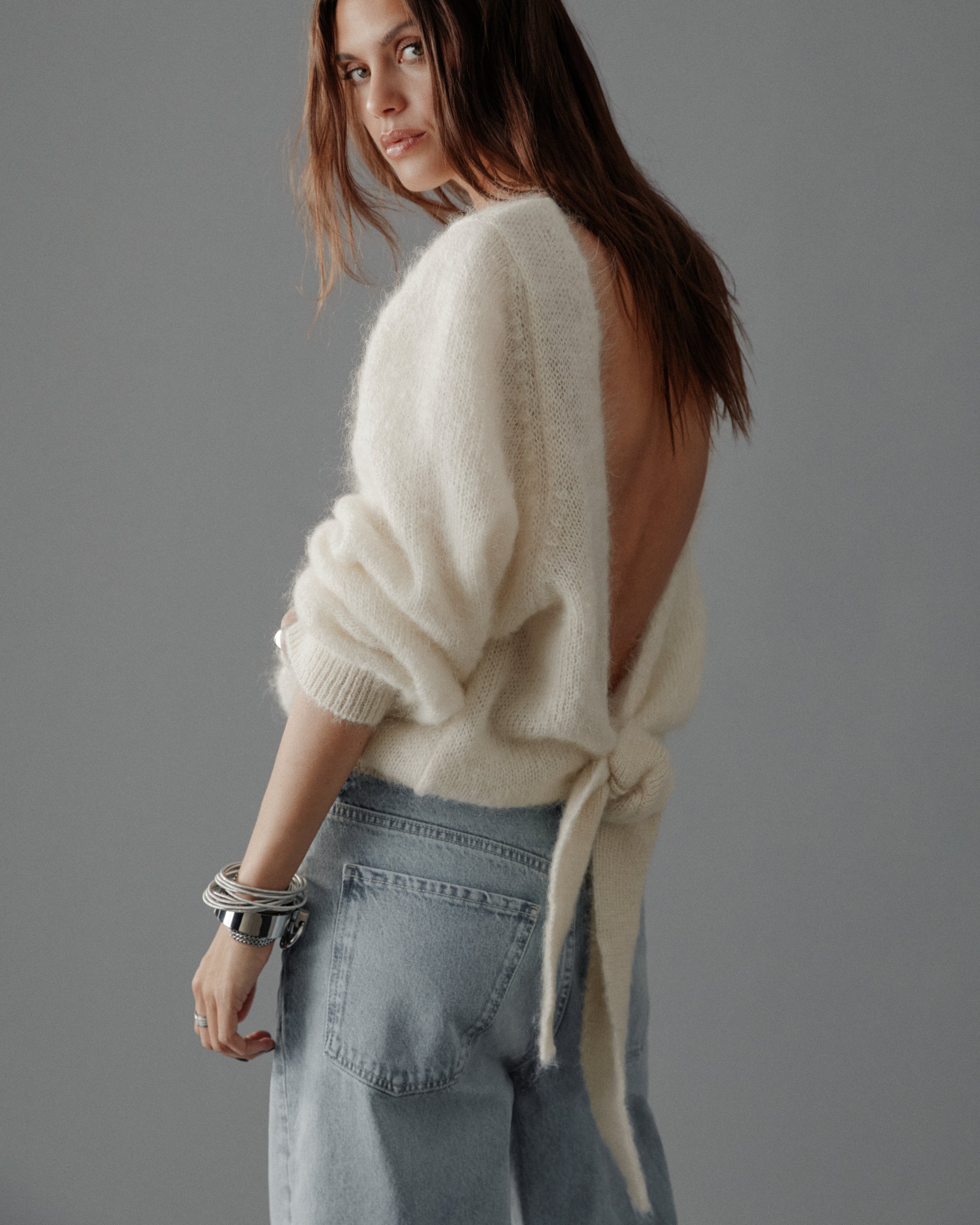 The Light Low Back Knotted Knit Sweater