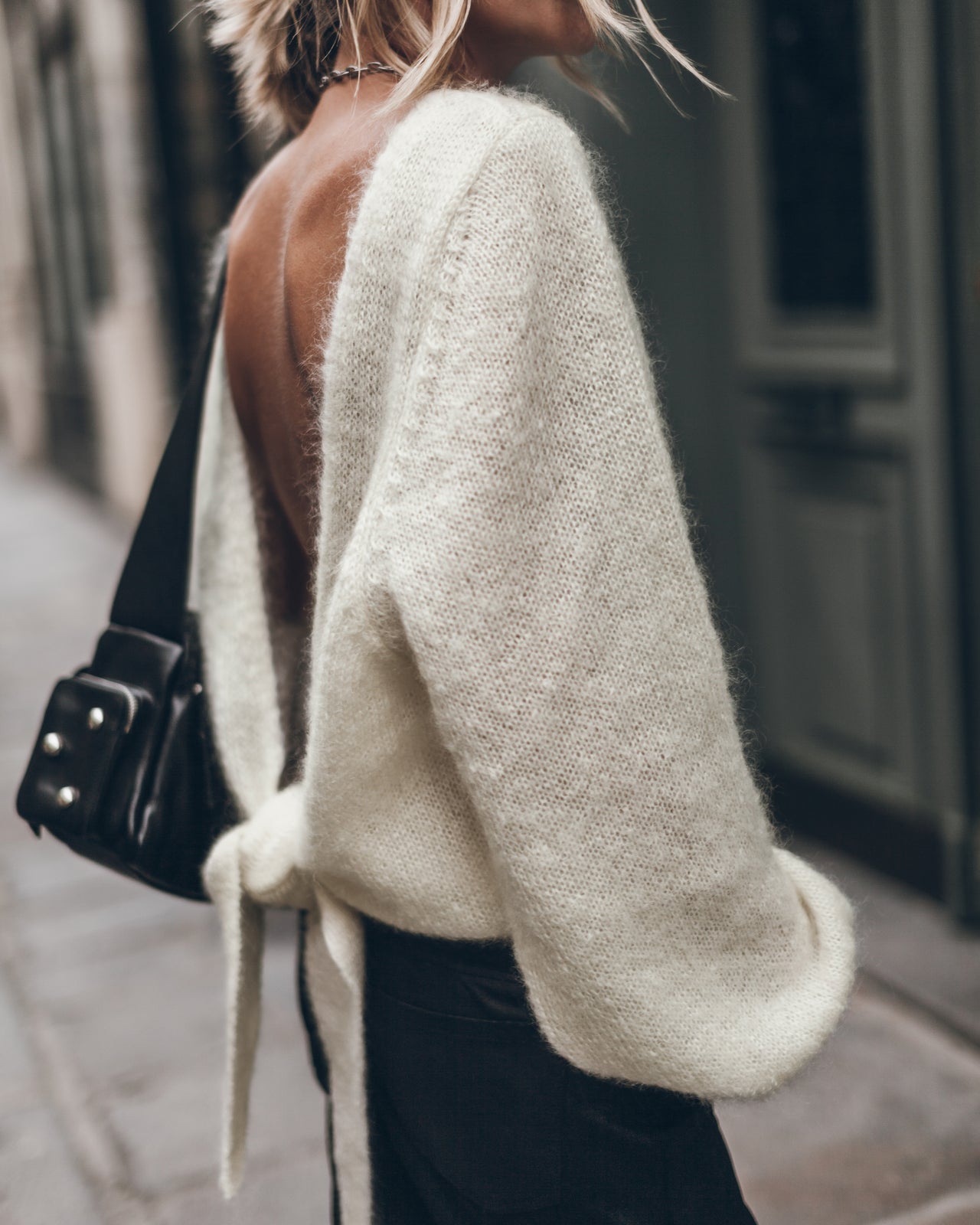 The Light Low Back Knotted Knit Sweater