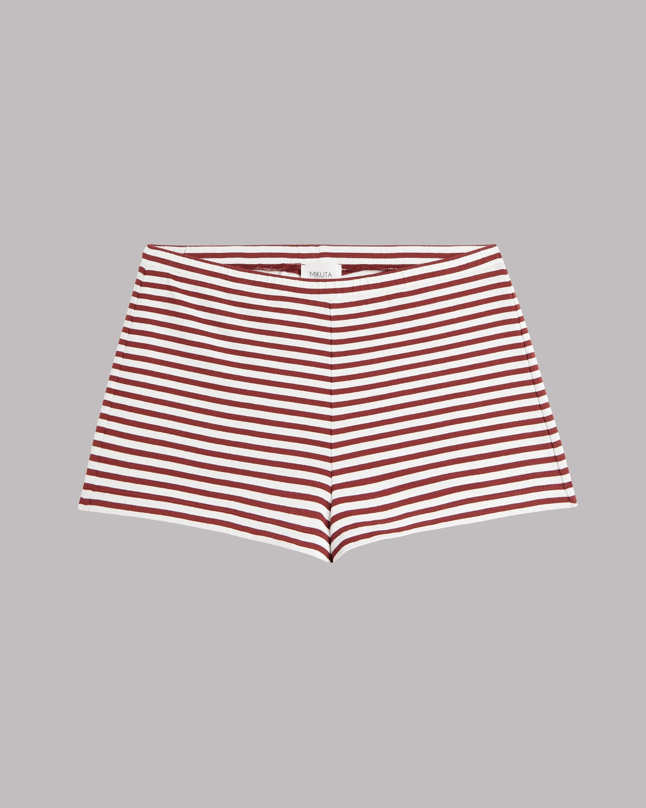 Red and white striped shorts on a gray background