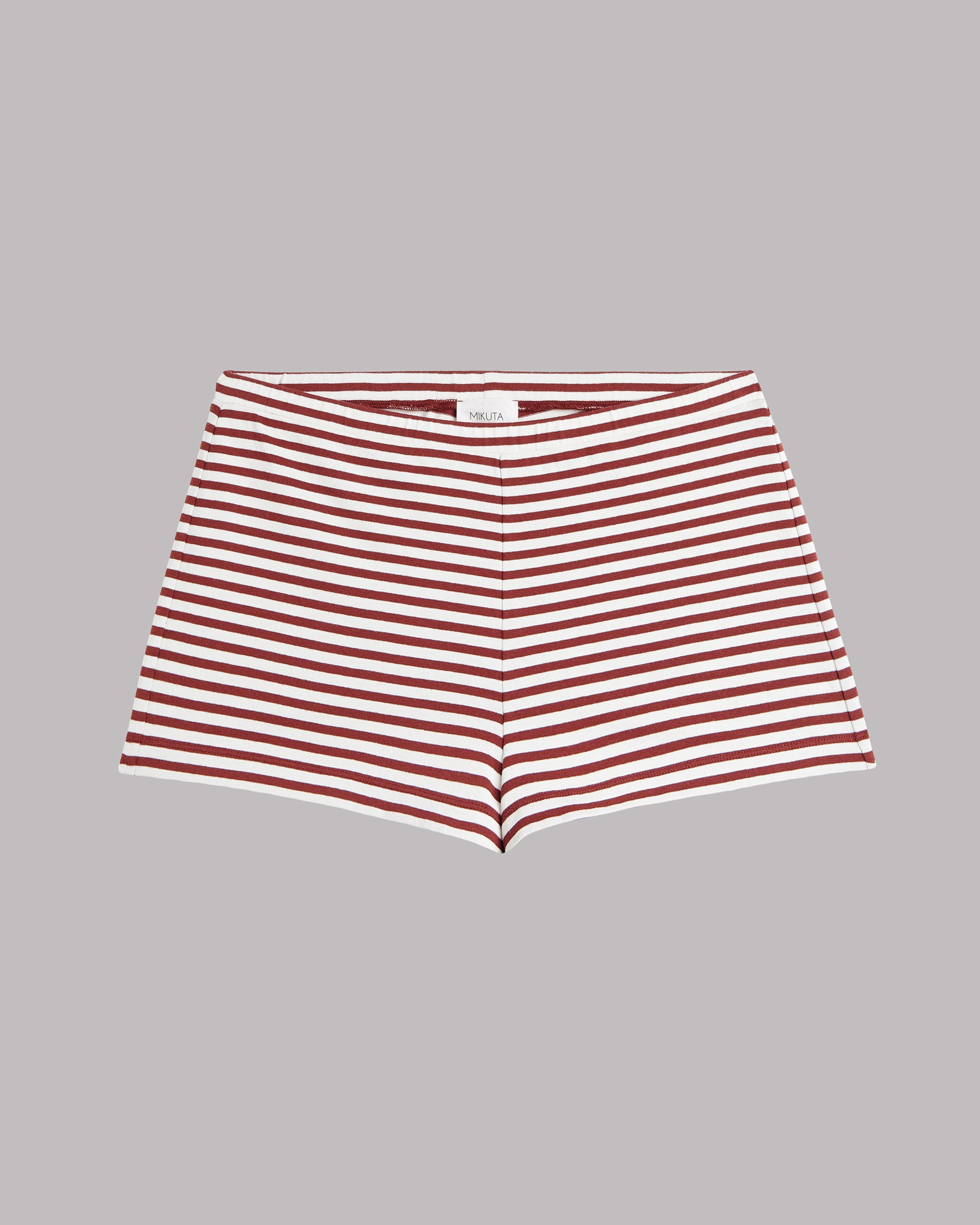 Red and white striped shorts on a gray background