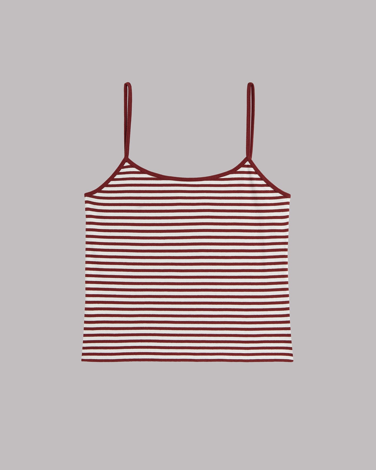 Striped tank top with thin straps on a gray background