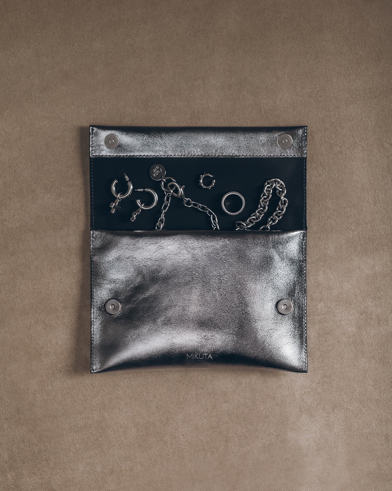 The Silver Leather Essentials Pouch