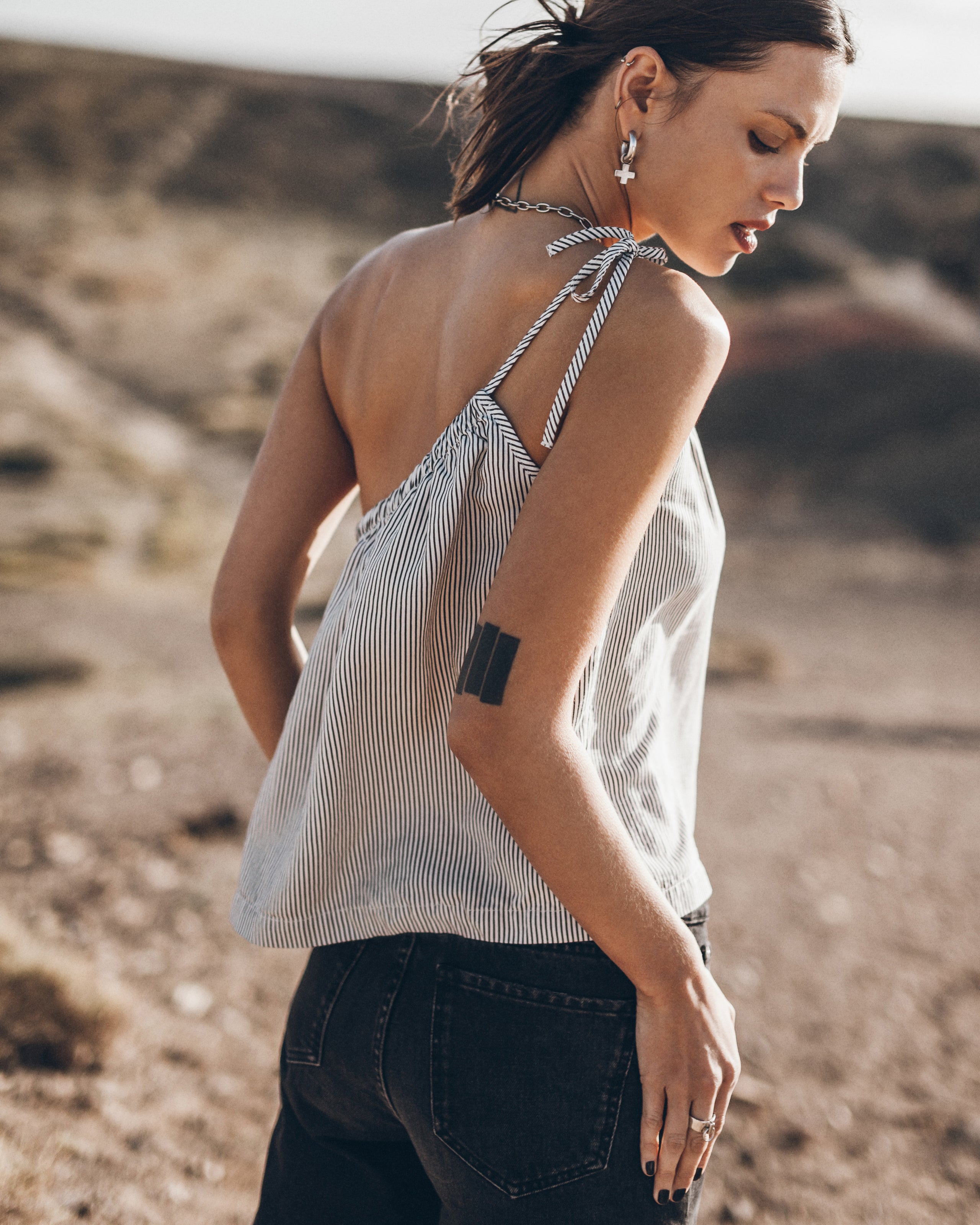 The Striped Asymmetrical Top