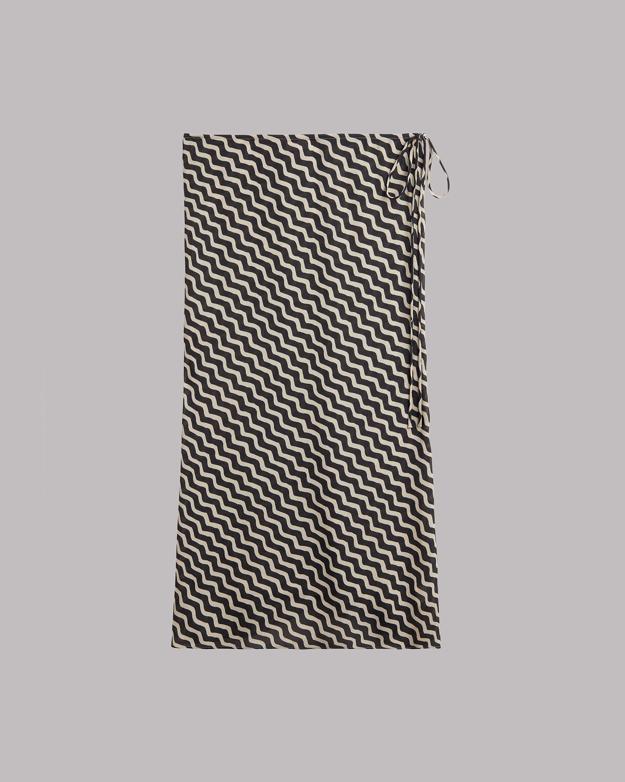 Black and white striped skirt on a gray background