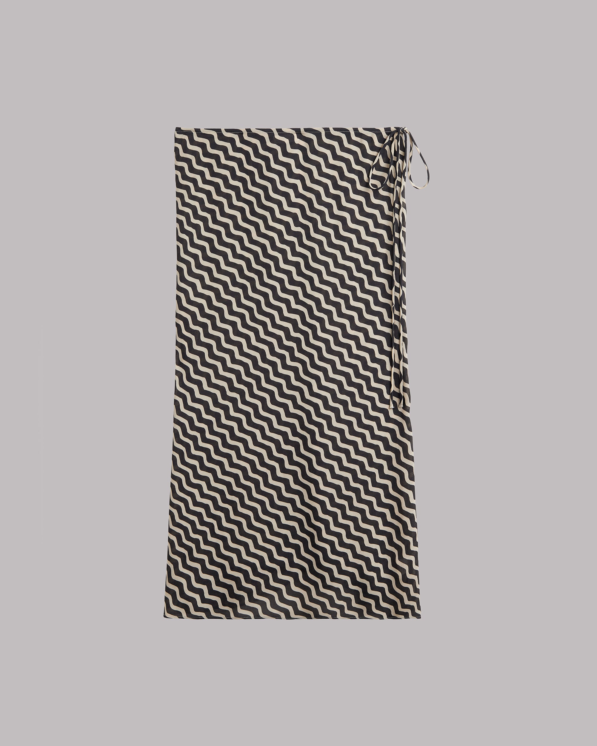 Black and white striped skirt on a gray background