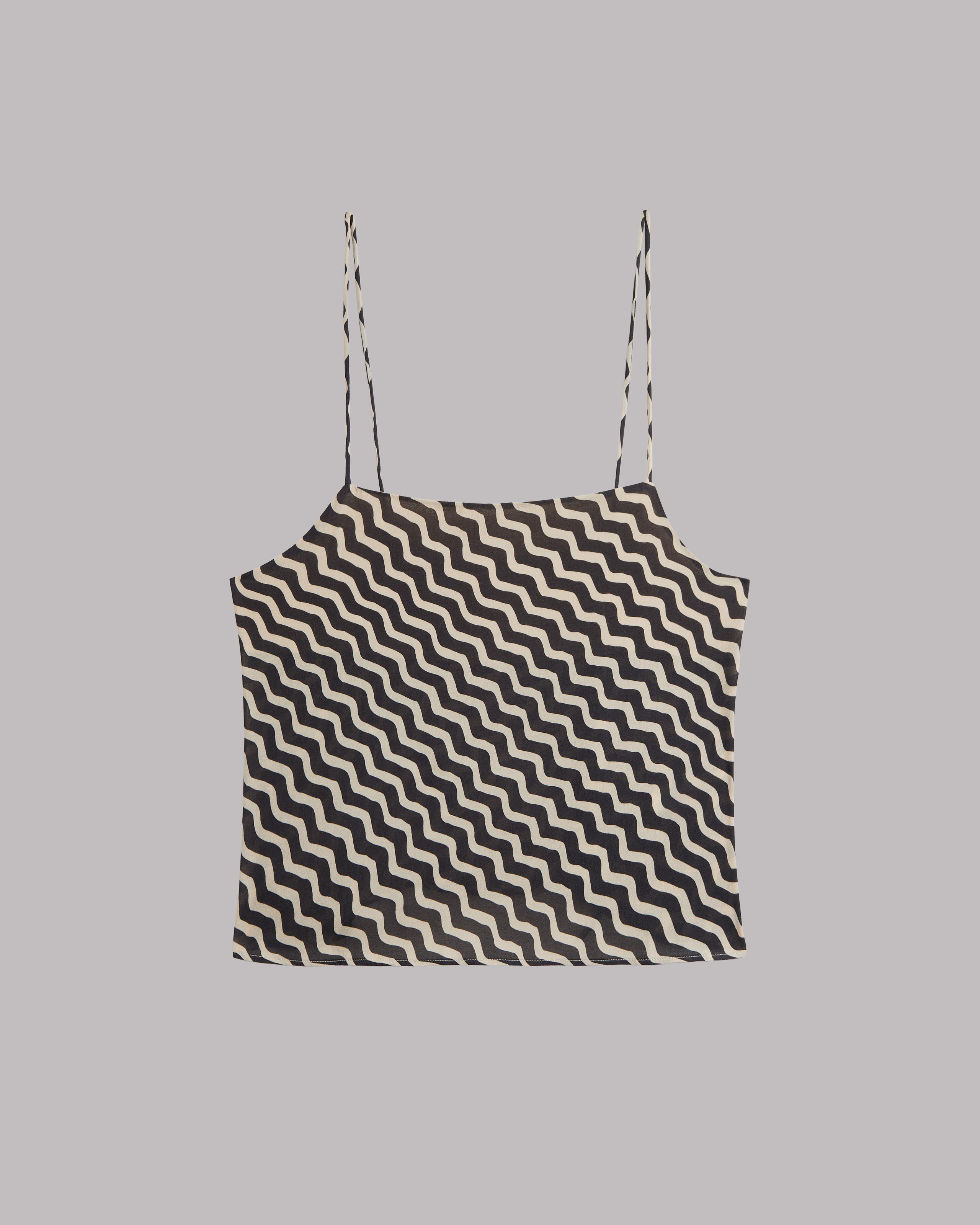 Black and white striped top on a gray background