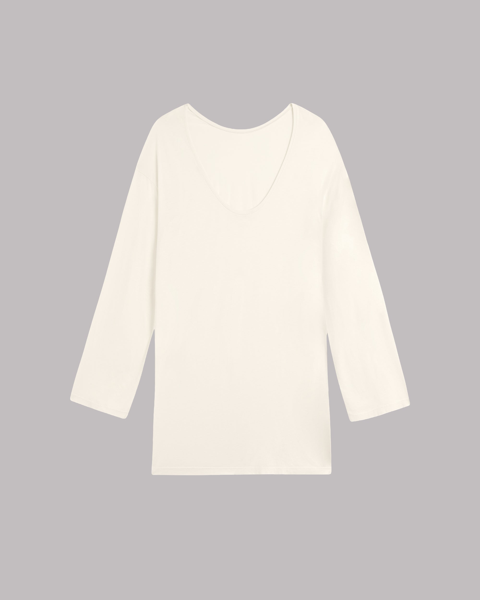 White long-sleeve top on a gray background.