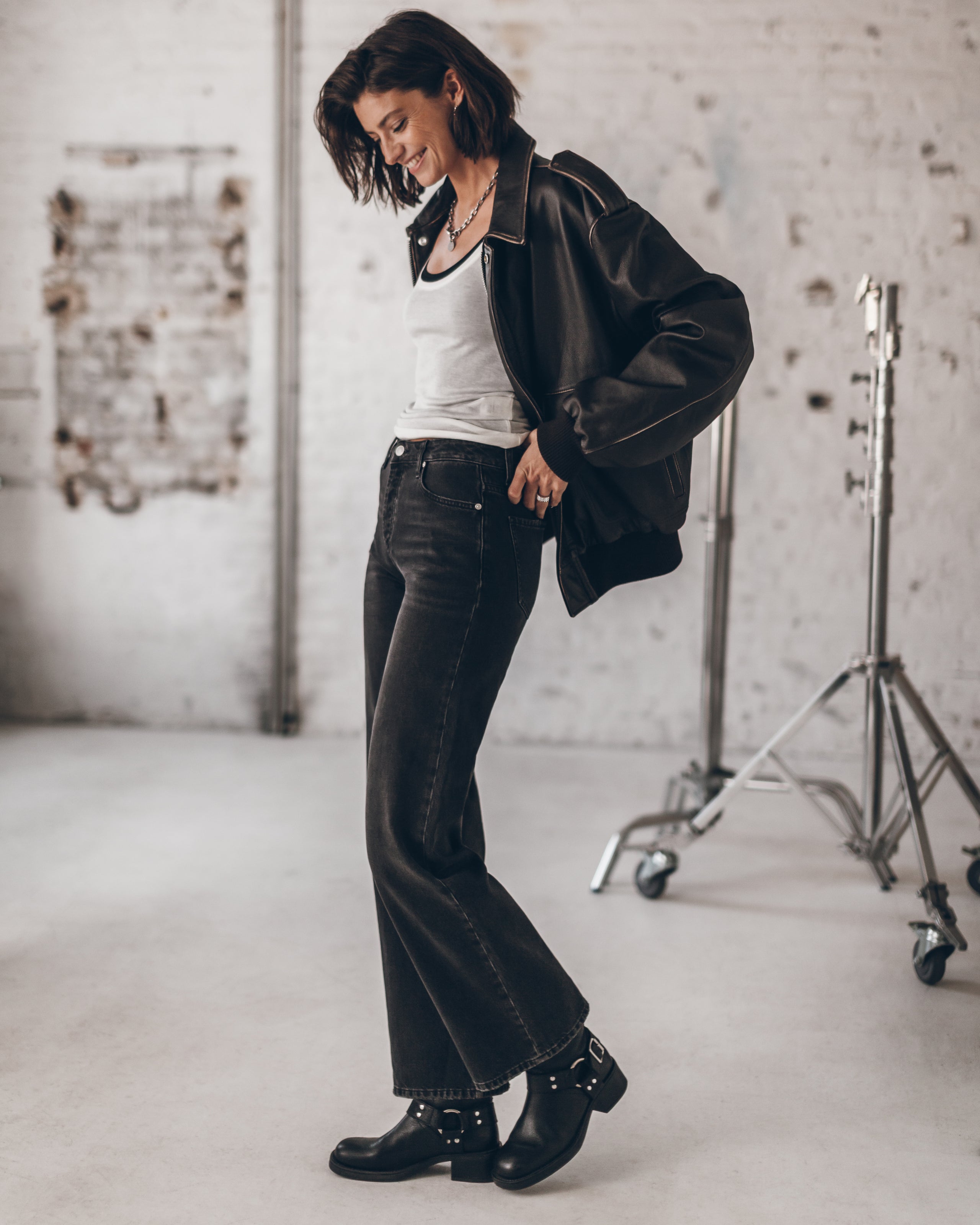 The White Sheer Tank Top The Black Sheer Tank Top The Black Loose Jeans The Brown Vintage Leather...