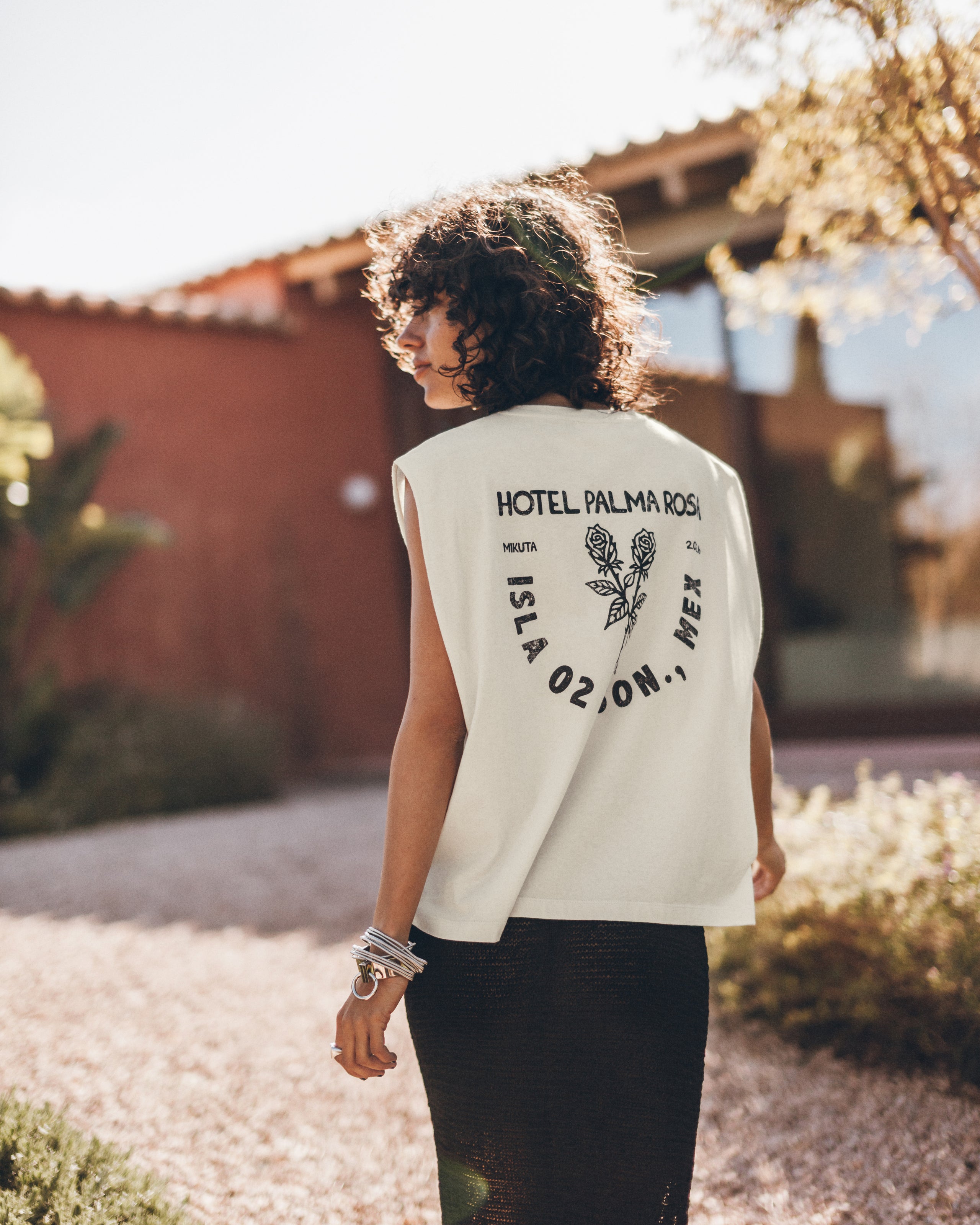 The White Sleeveless Unisex T-Shirt