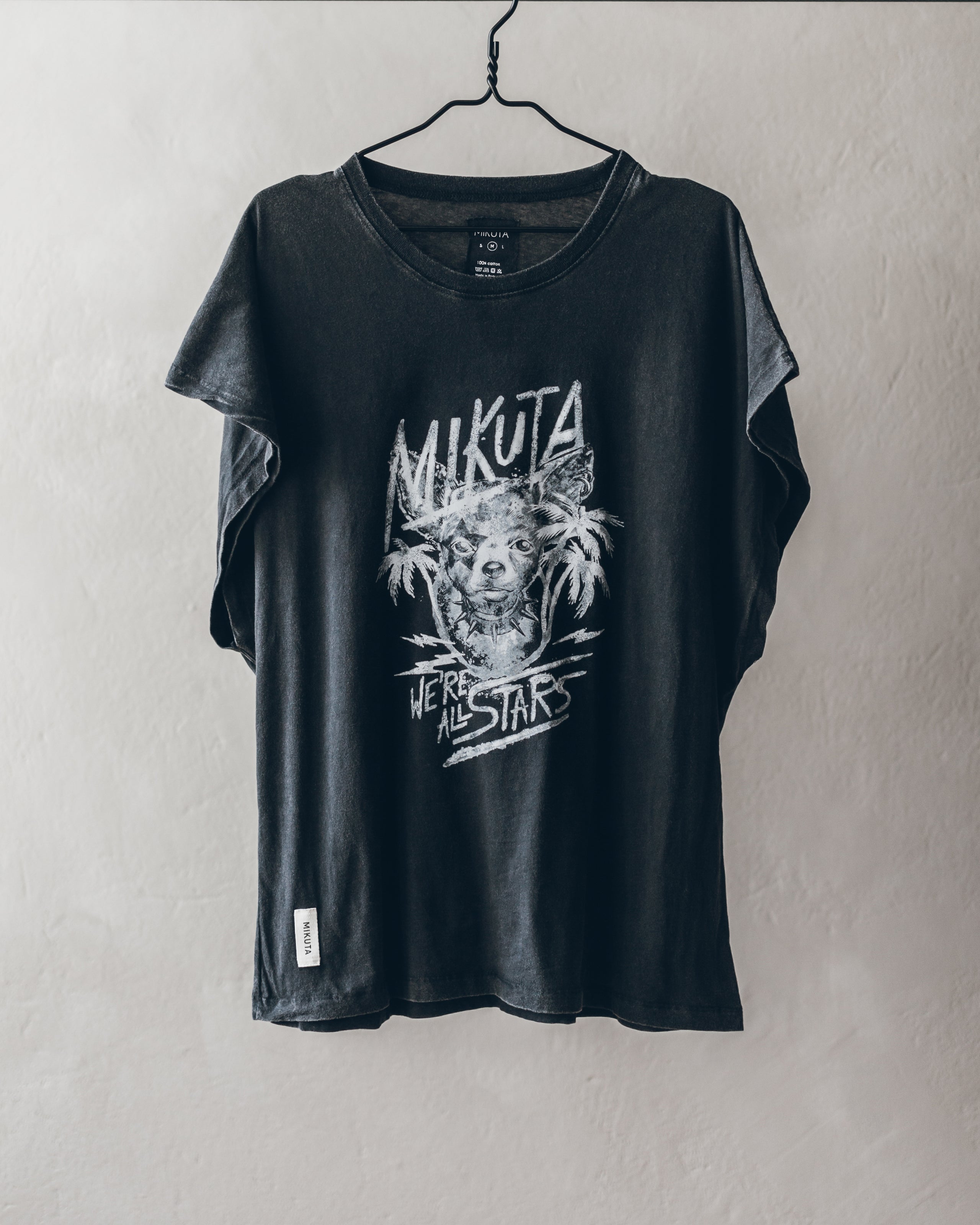 Black short-sleeve T-shirt with white graphic palm tree and text design, crew neckline.